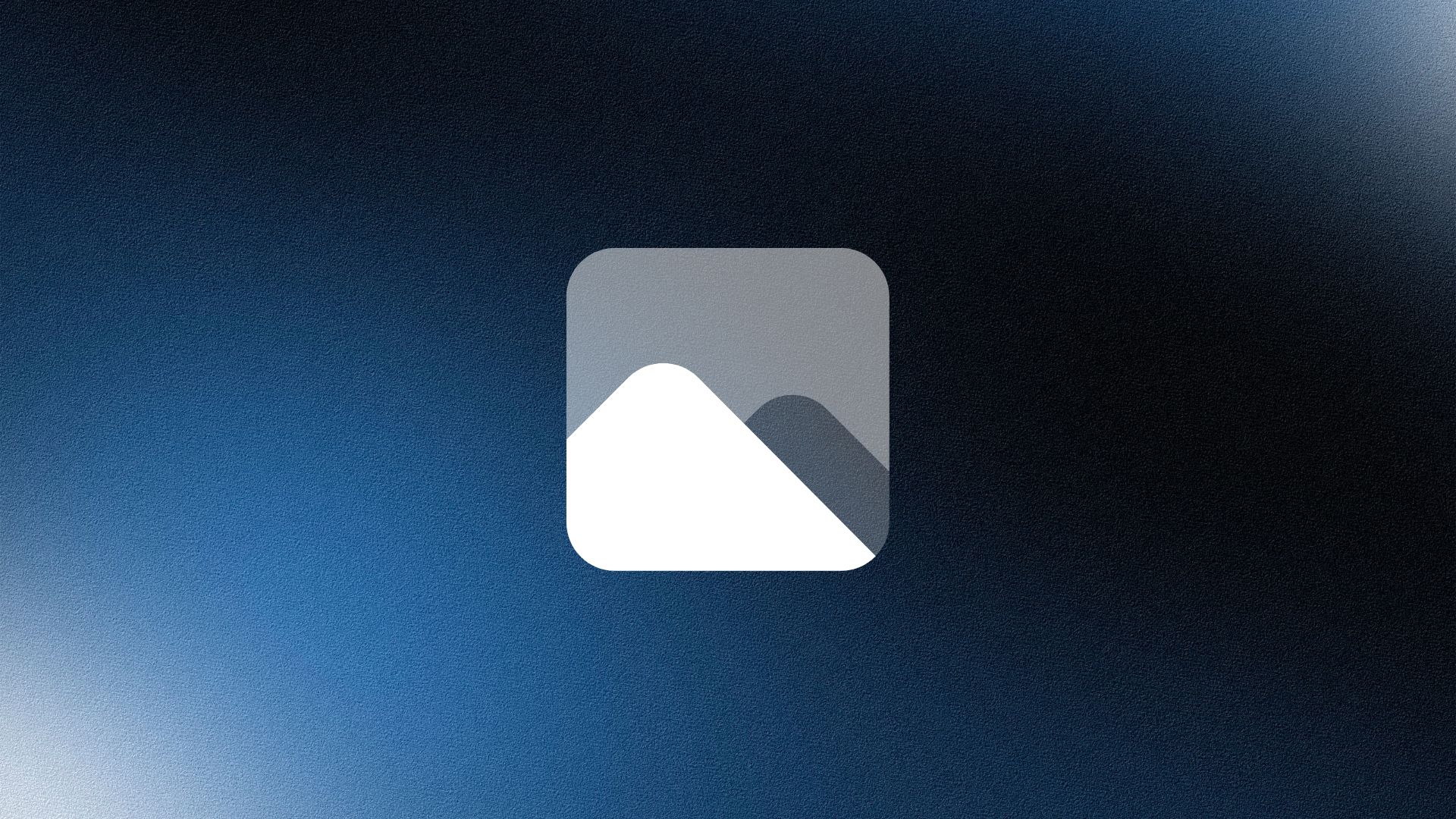 Two professionals standing confidently in front of bookshelves, both with arms crossed, in a softly lit office.