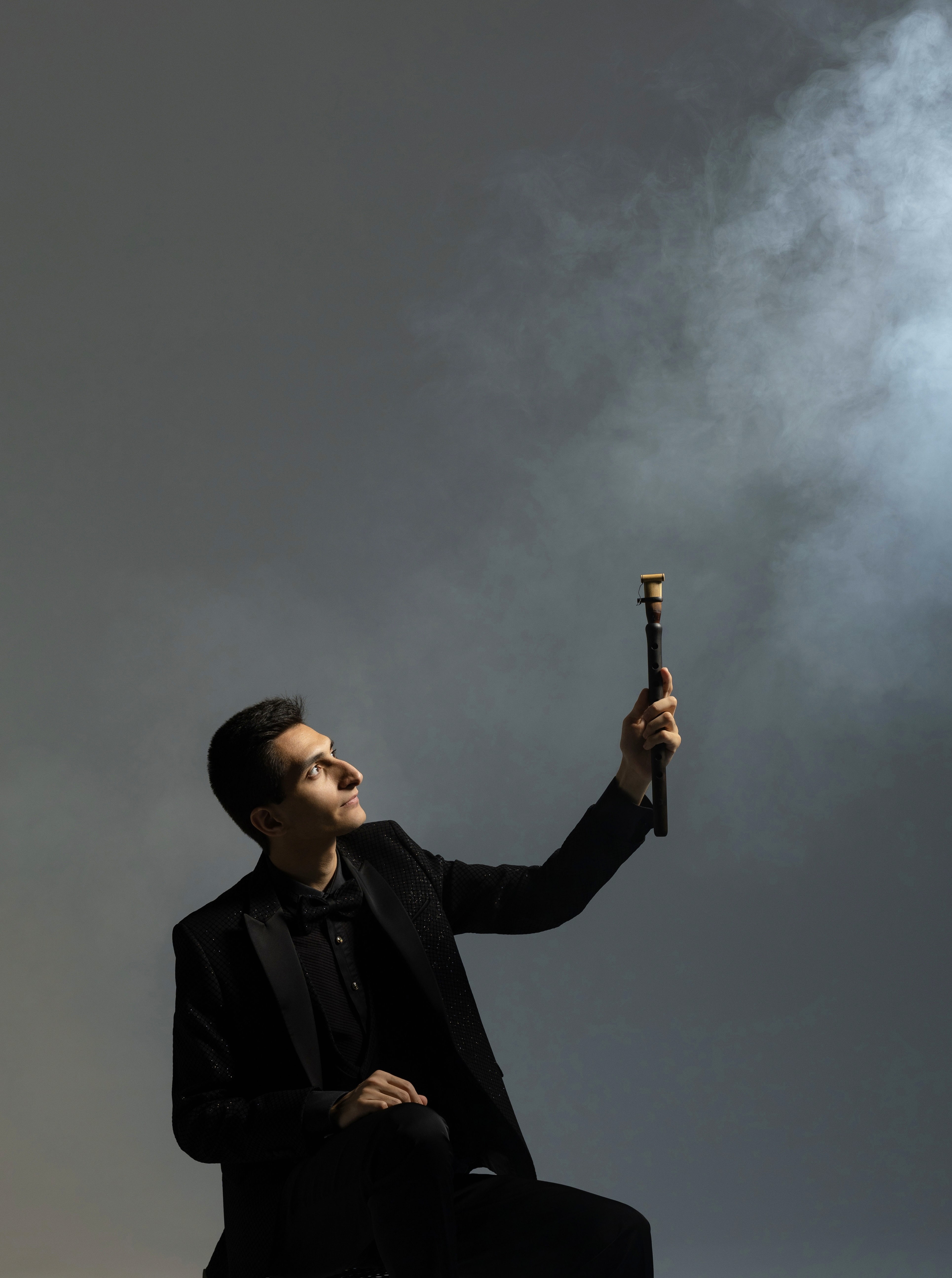 Erik Mirzoyan holding a duduk.