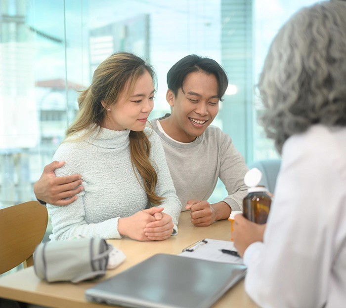happy gay couple at table
