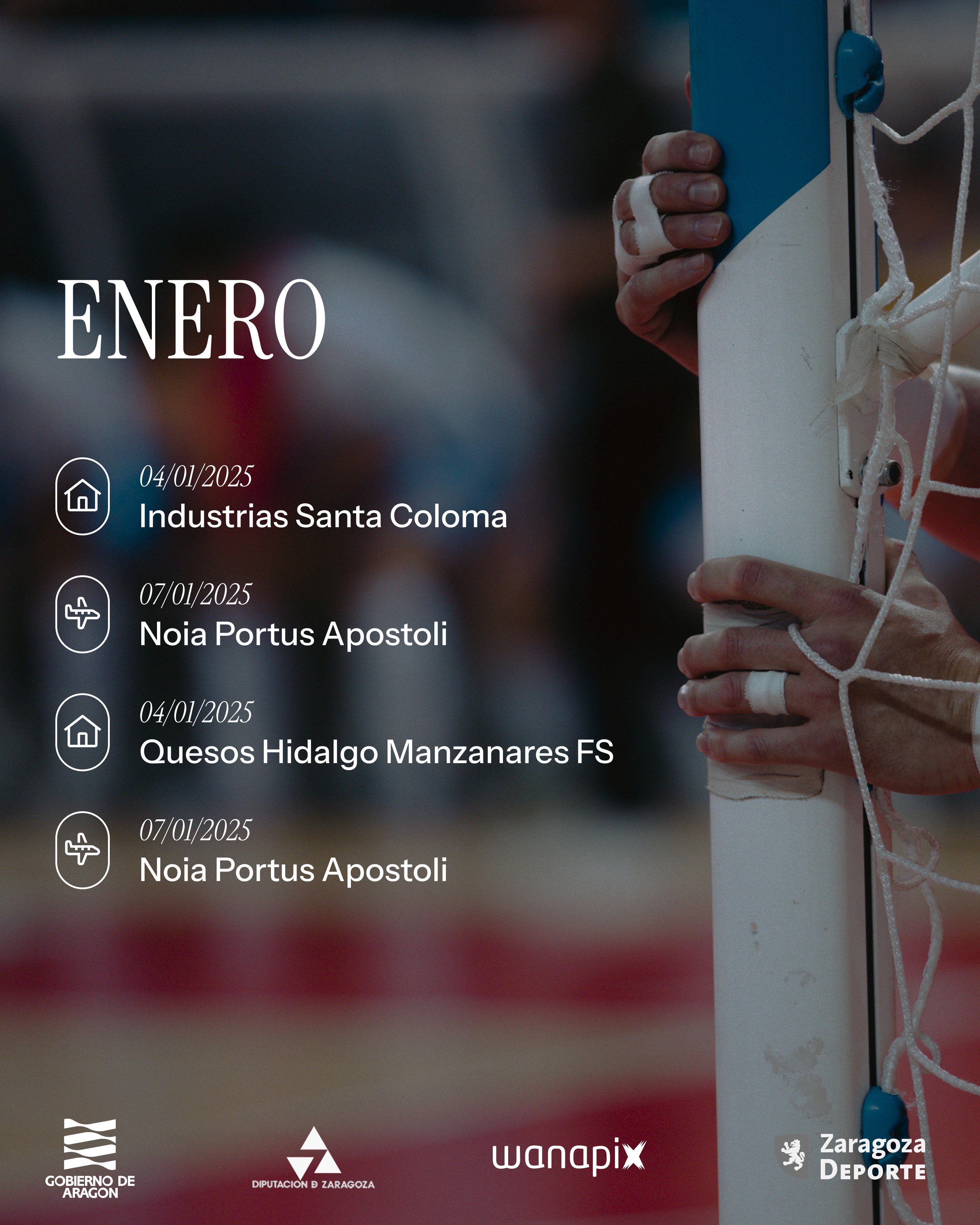 A view of a studio interior with modern decor, featuring large windows that offer a glimpse of lush greenery outside