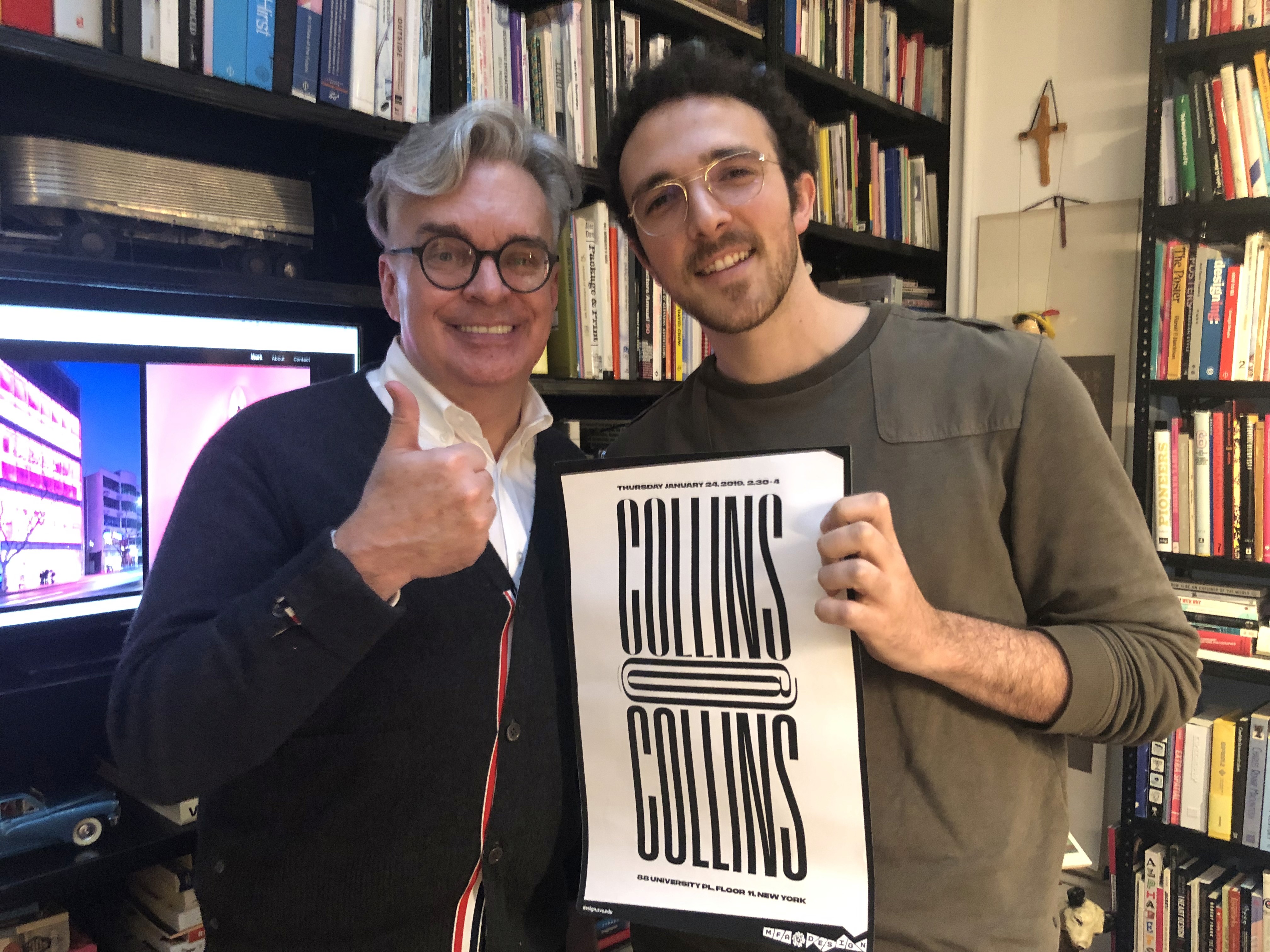 Brian Collins with a student holding a poster