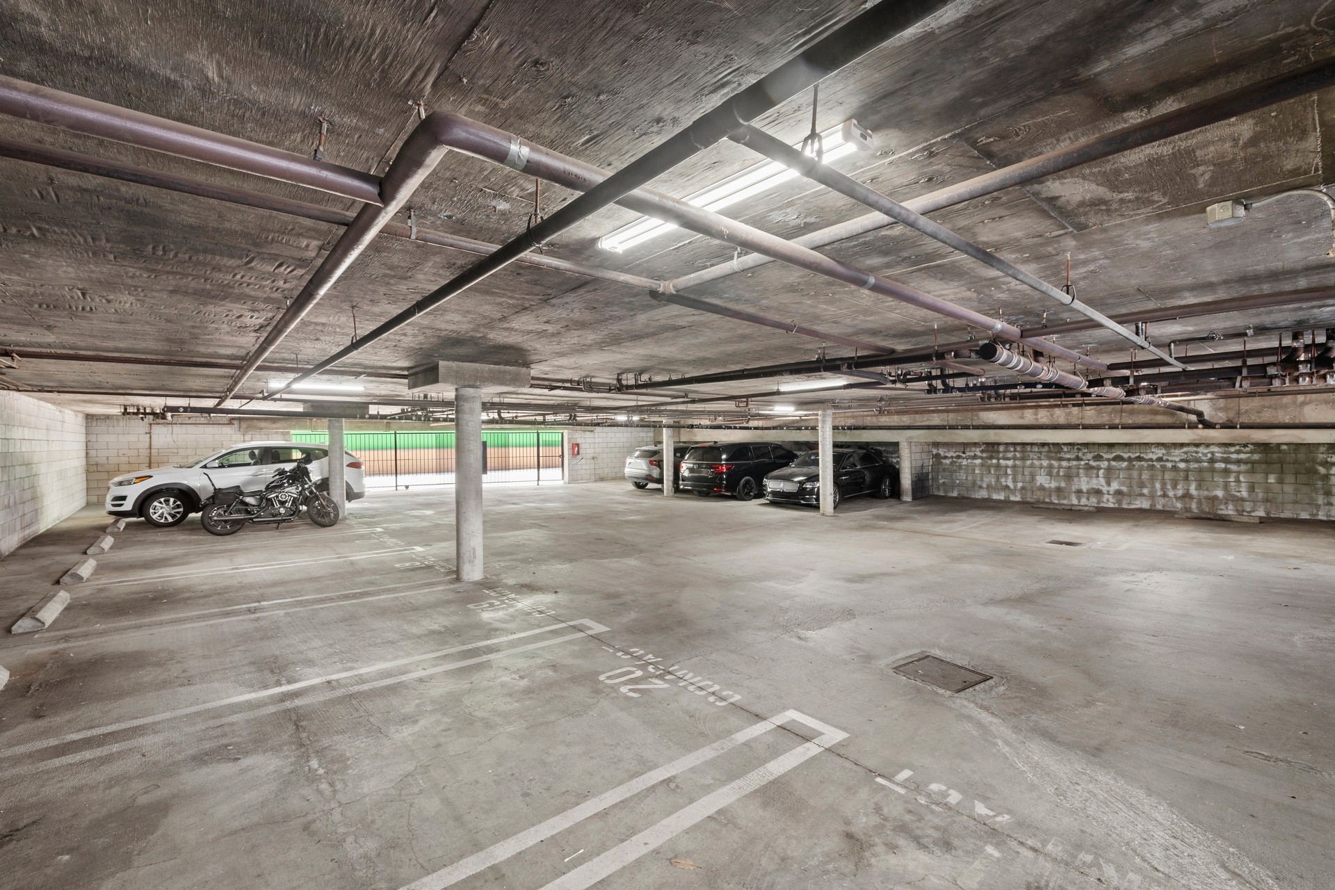 Subterranean parking garage at 18620 burbank blvd apartment property.