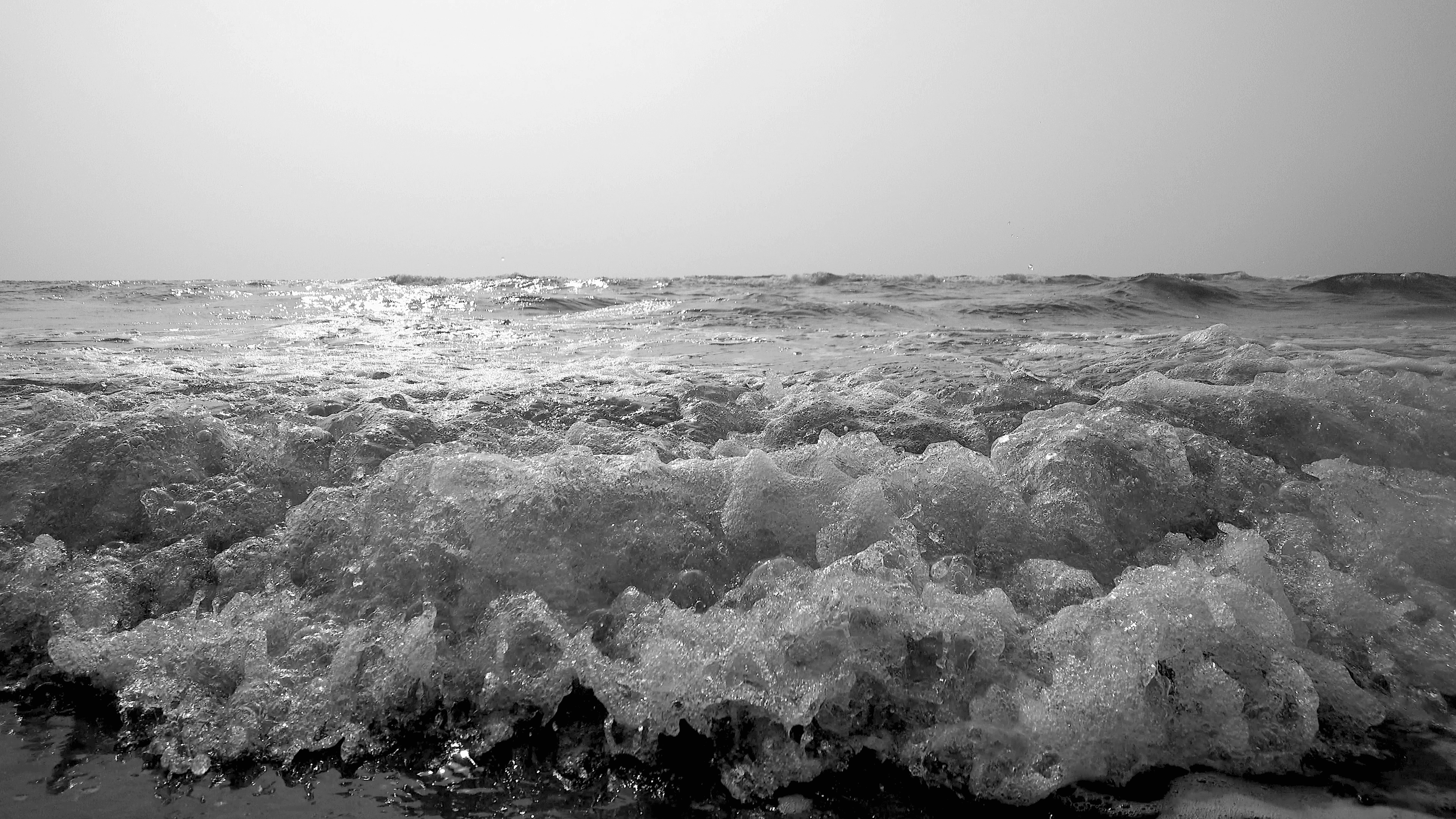 Soft white clouds on a light background, decorative visual for website design