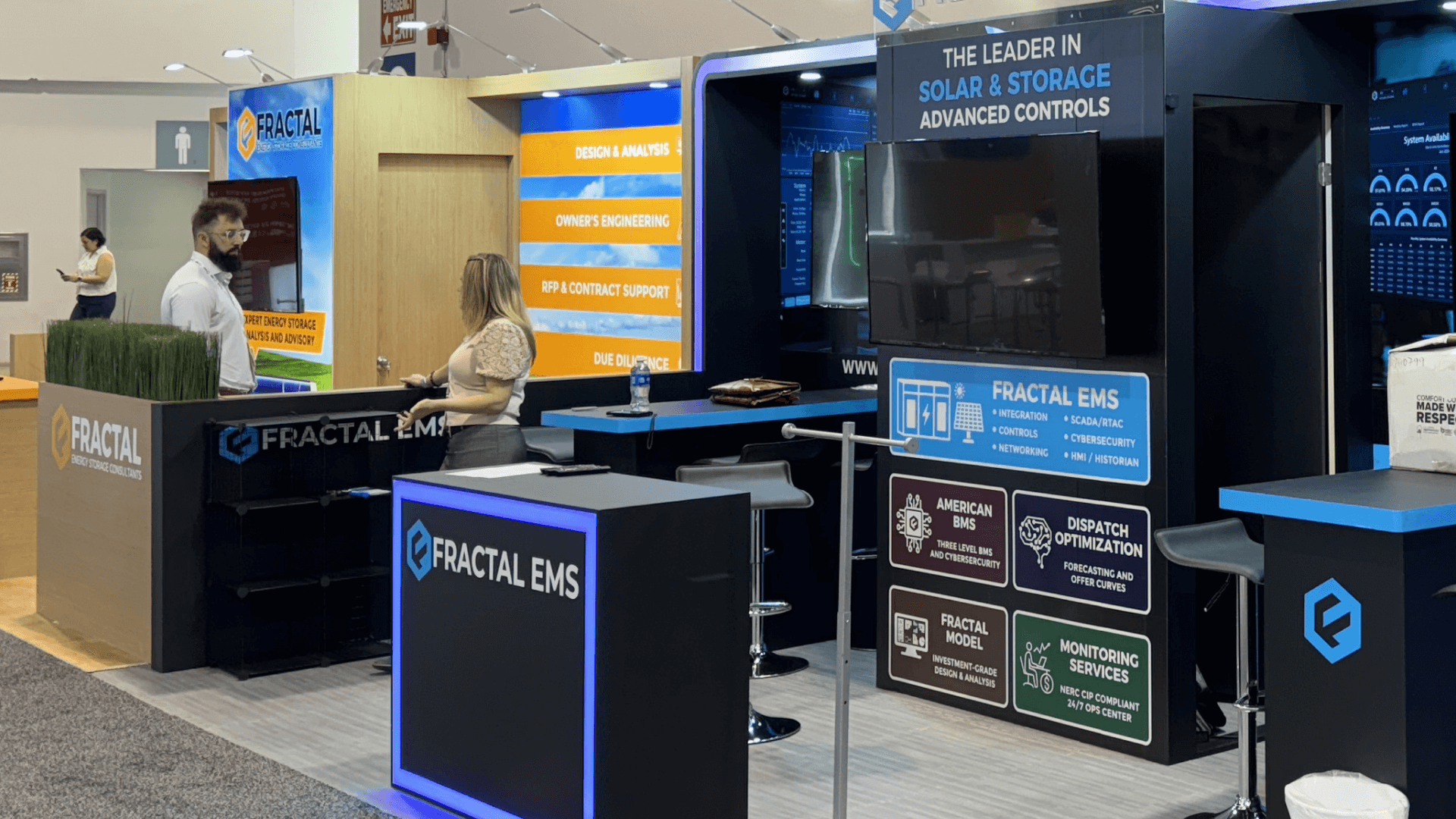 10x20 RE+ trade show booth consult counter setup designed for short technical conversations without blocking aisle circulation.