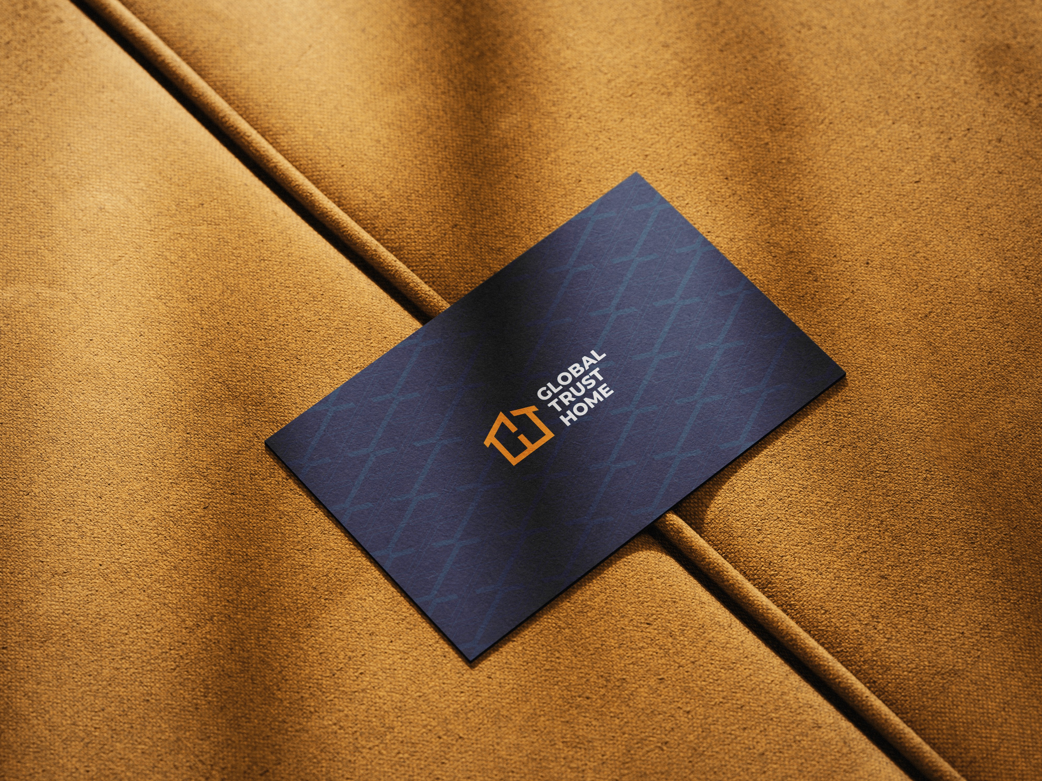 Shiny metallic silver foil pouch lying flat, printed with a large black outline of a smiley face, all set against a bright orange backdrop.