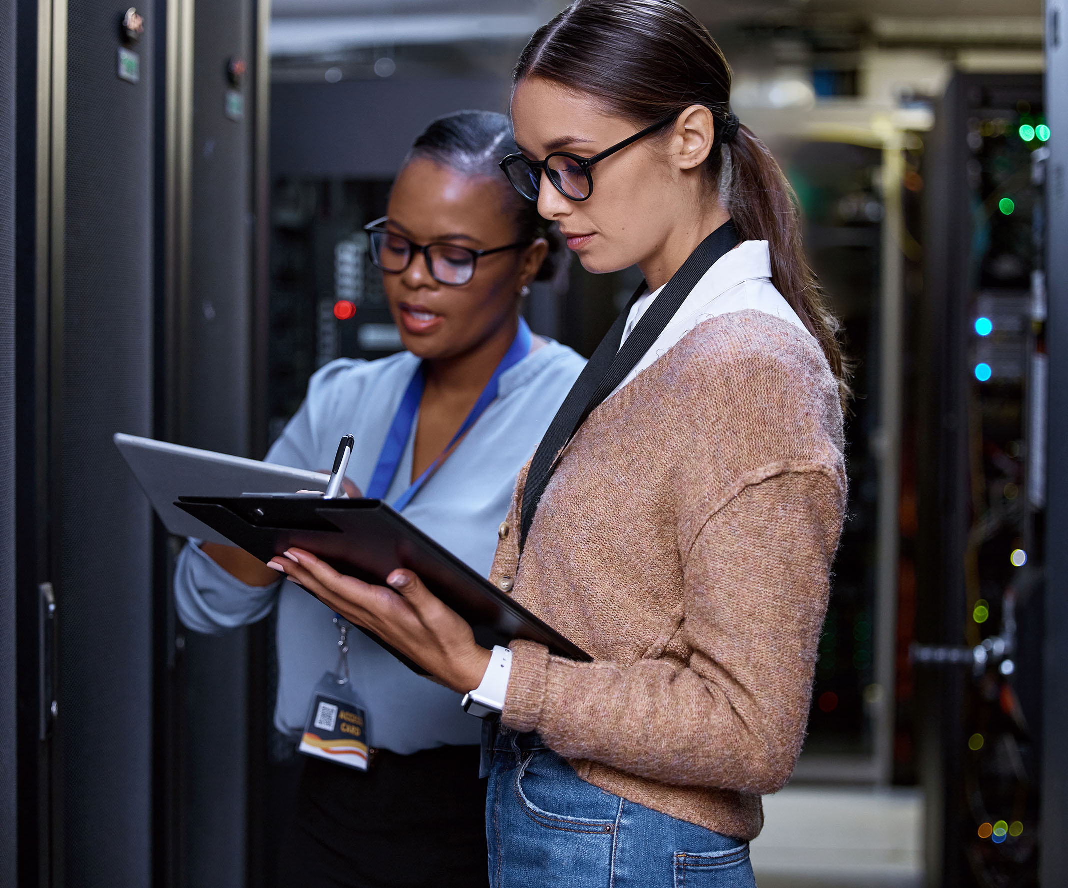 Male engineer in orange uniform and helmet standing with arms crossed Ask ChatGPT