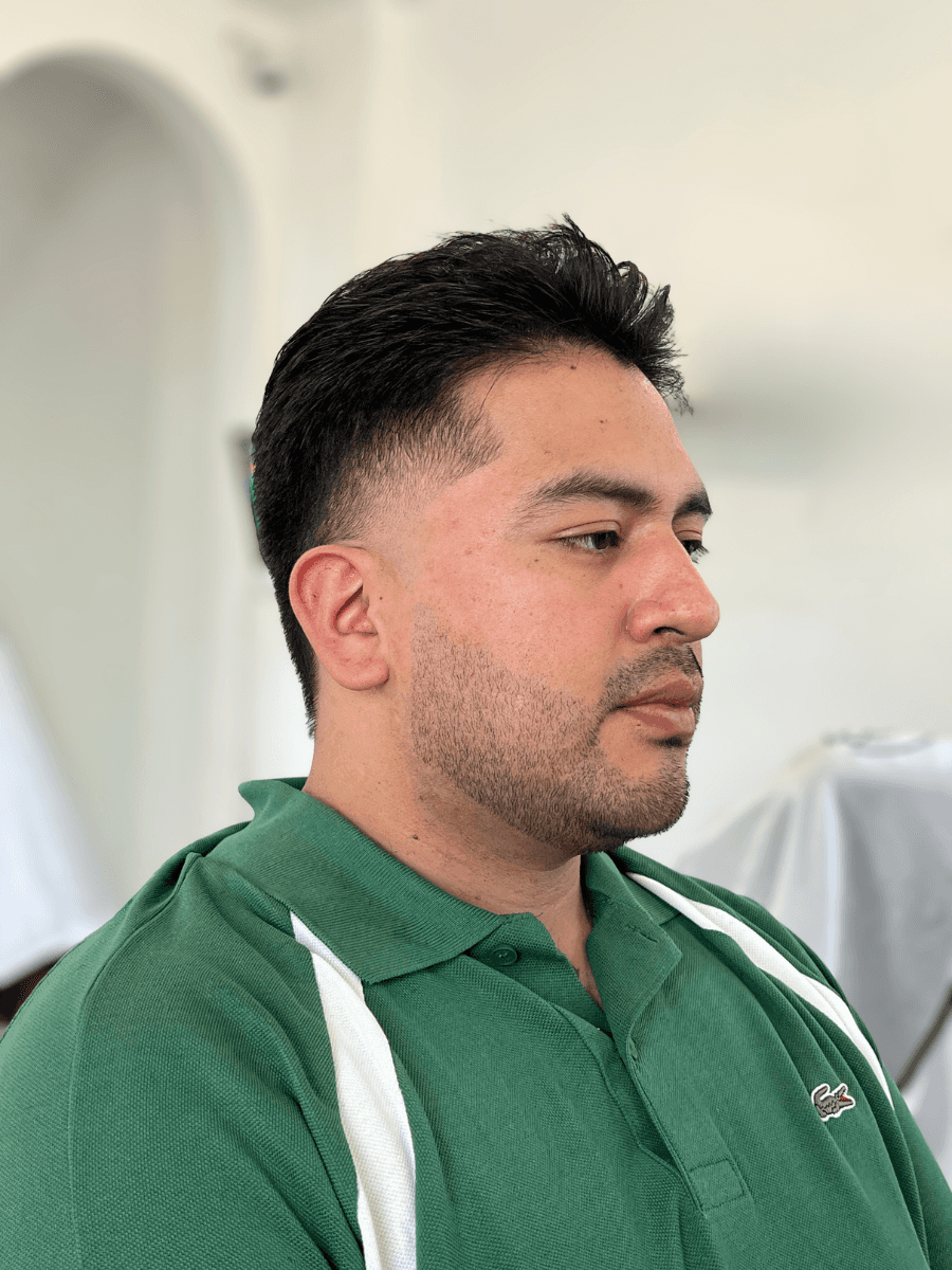 white and brown rabbit looking at camera