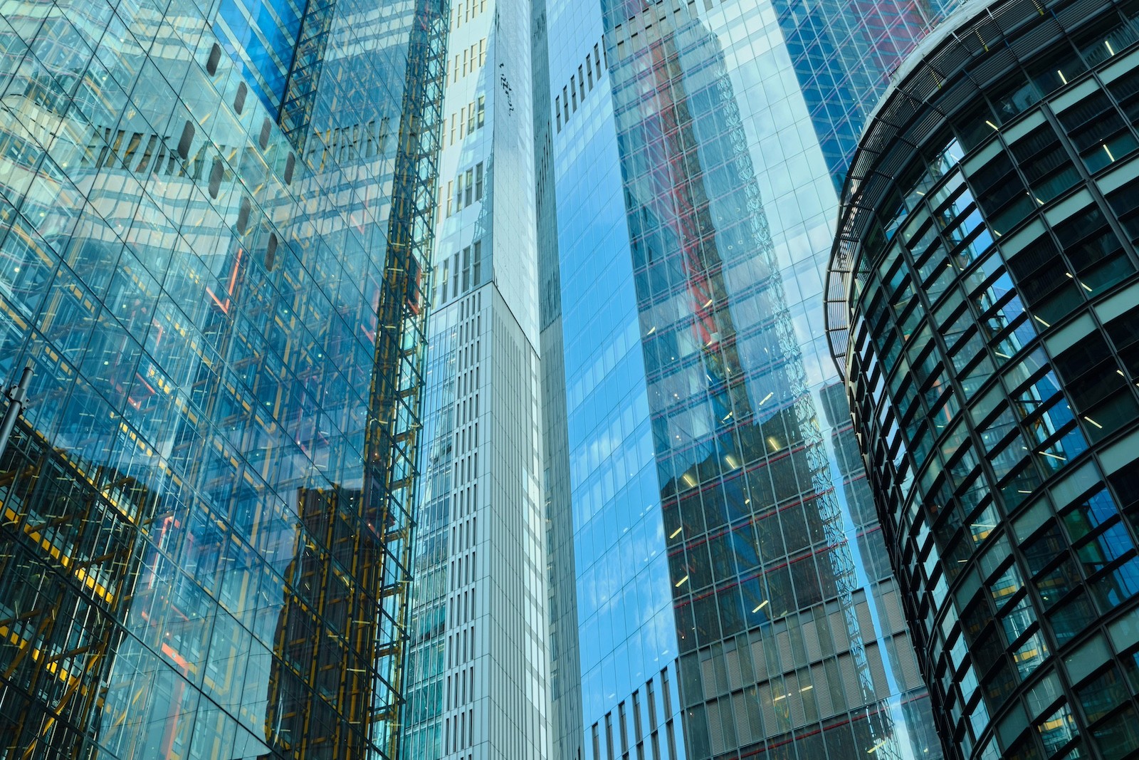 Modern layered glass architecture representing how family investment companies and family trusts work together within a structured wealth framework
