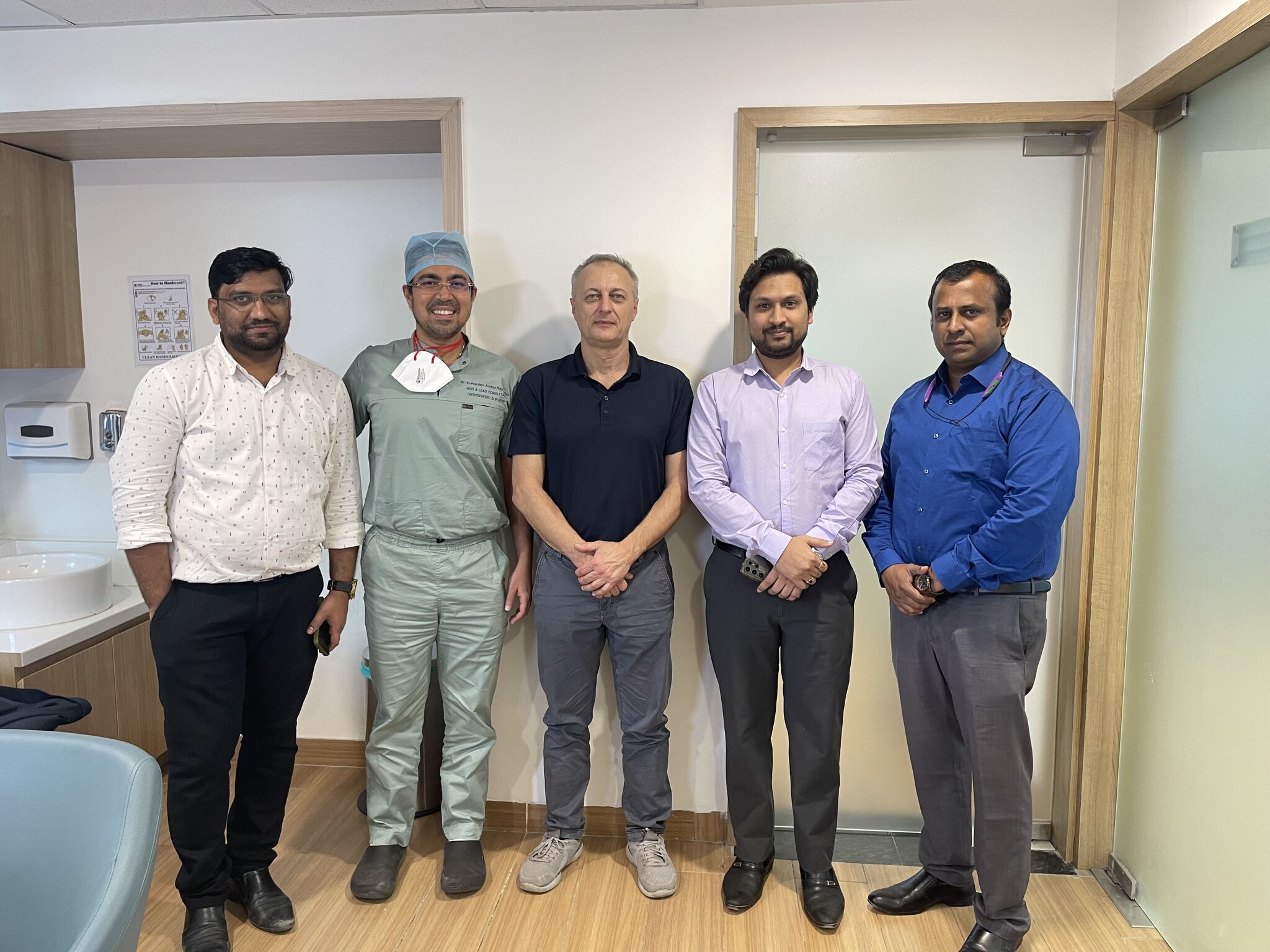 A fantasy portrait of a blonde woman with curly hair standing next to a glowing, large white flower