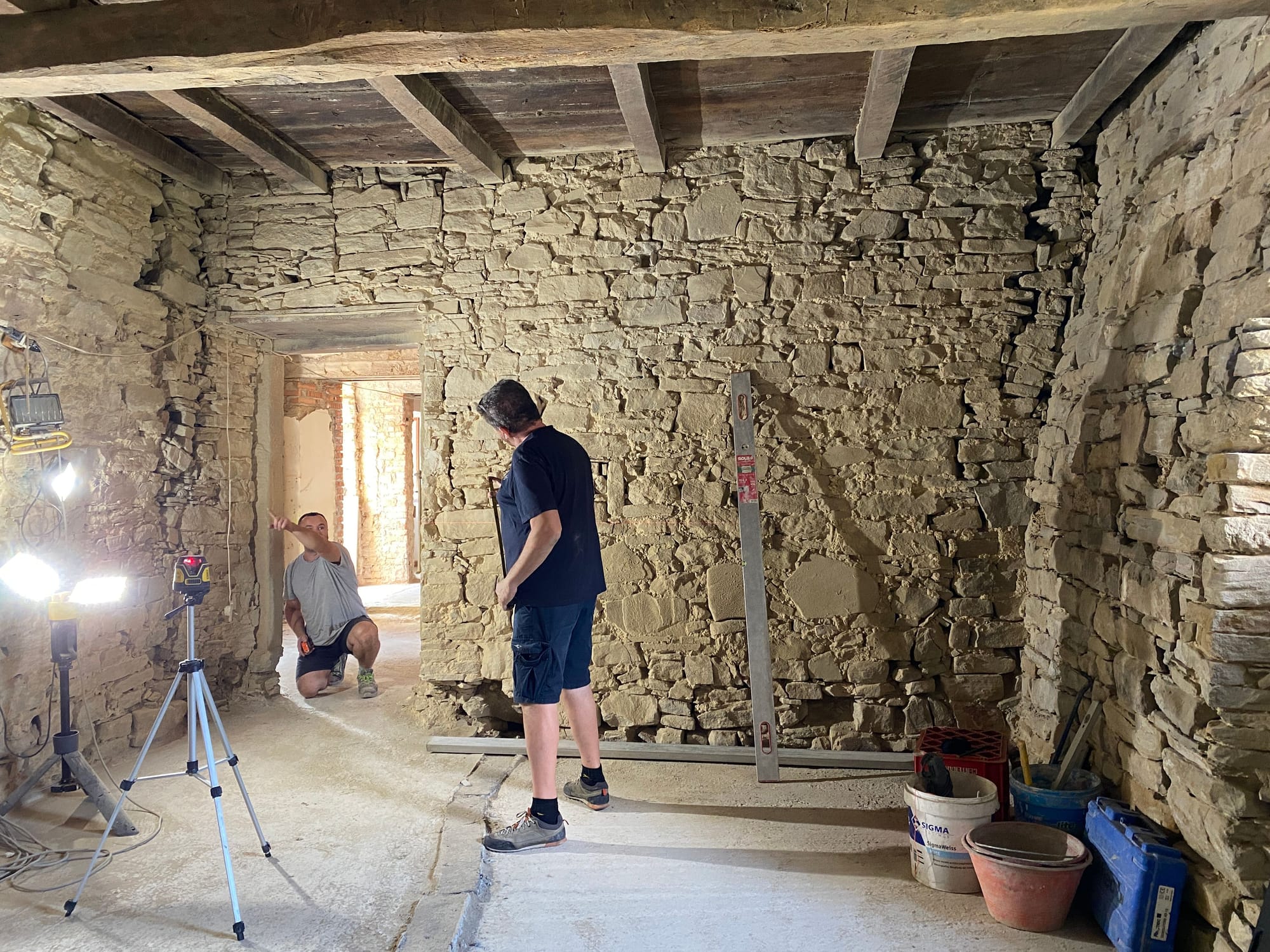 Survey of the stone walls with a laser level