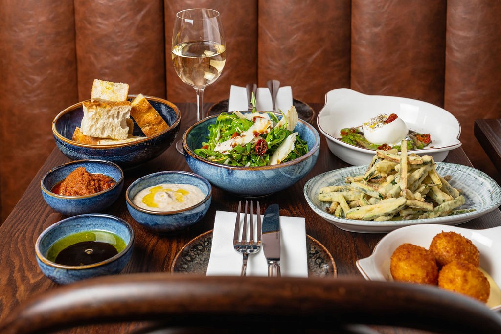 a vanilla ice cream with matcha cream served in a white plate