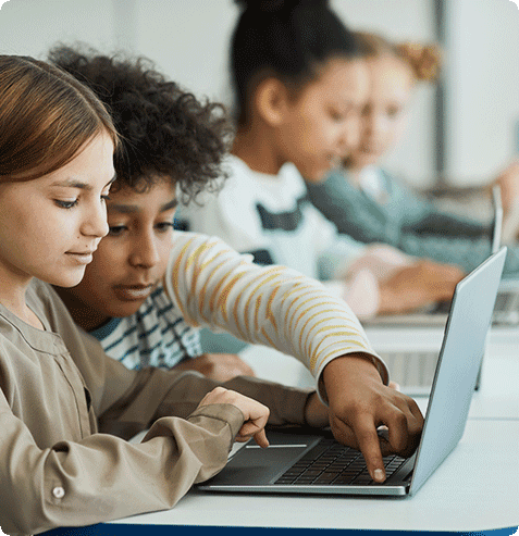 Kids developing programming skills in interactive after school coding and computer science program