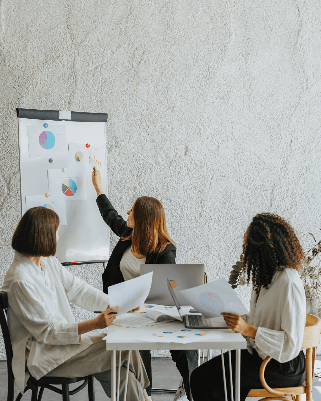 Two professionals reviewing AI-powered business tools
