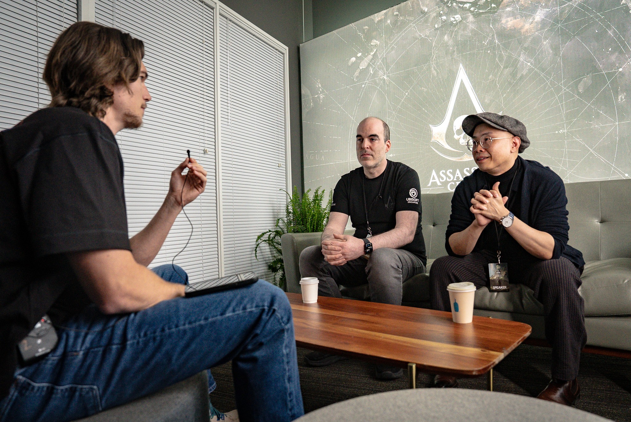 Industry professionals talking around a table at a gaming event