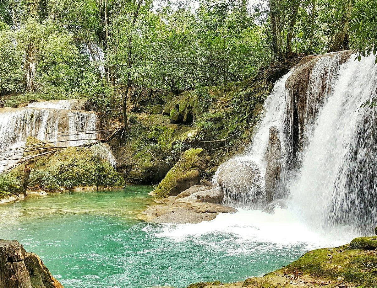 Milky-turquoise pools and travertine ledges at Cascadas Roberto Barrios.