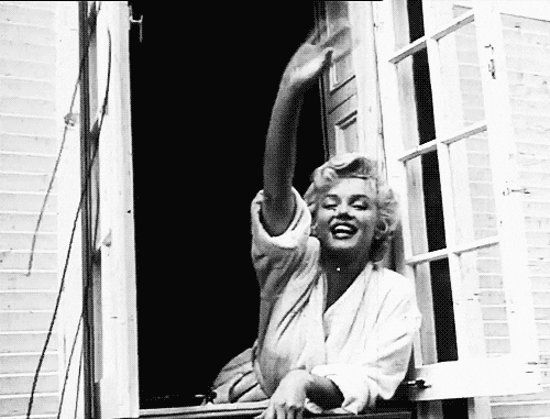 Vintage gif showing Marilyn Monroe waving goodbye
