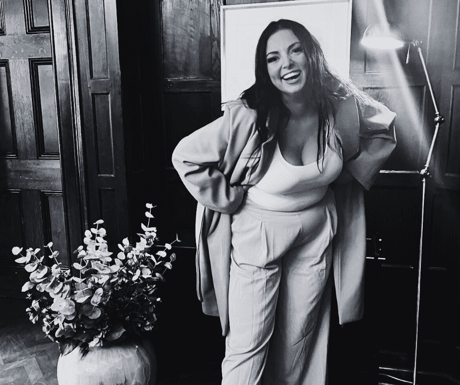 person sitting in a chair in front of a man