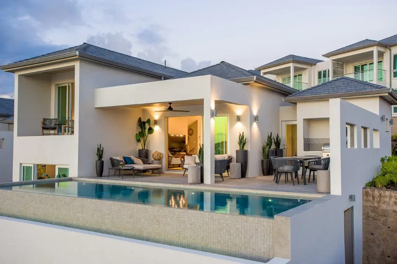 Completed resort villa with private pool and covered outdoor living area at Calivigny Point Grenada