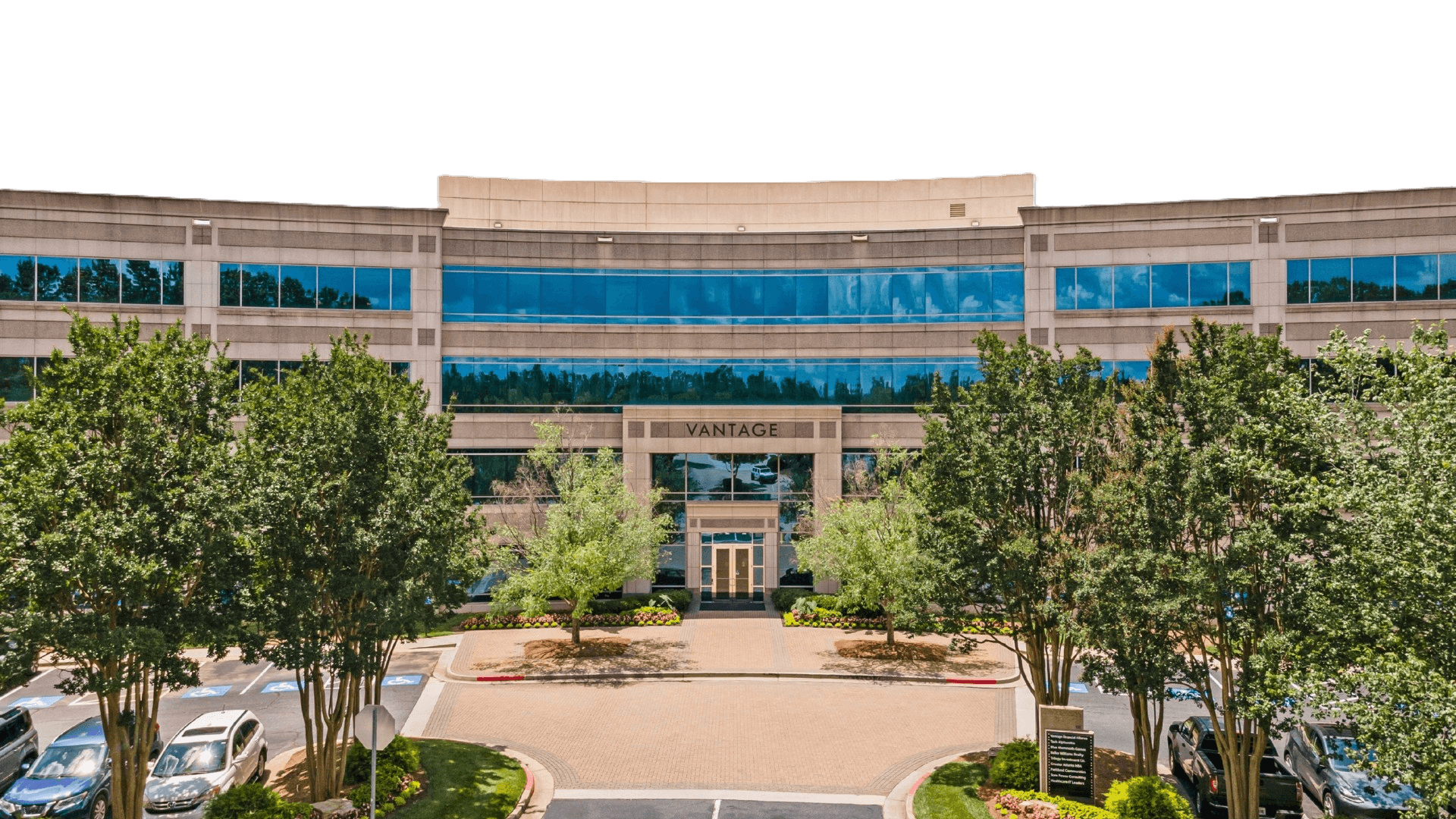 modern sculptural building with curved wooden exterior