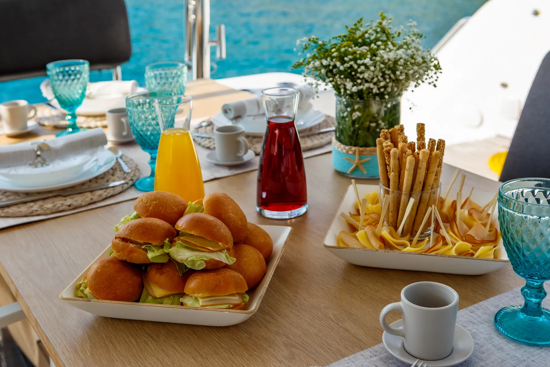 White Rock 36 speedboat with captain at helm cruising calm blue waters near Paros coastline with hills in background.