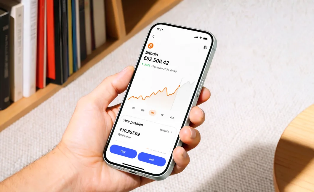 Bitstack app portfolio screen held in hand