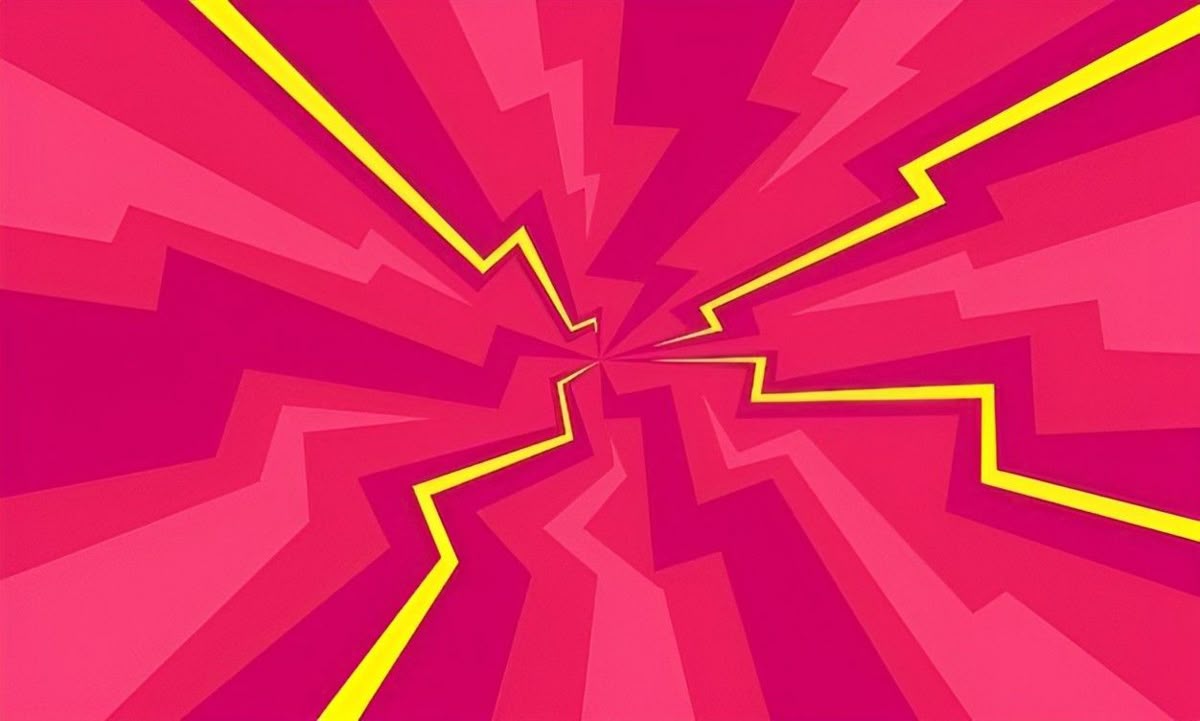 A woman smiling at the camera in a cafe