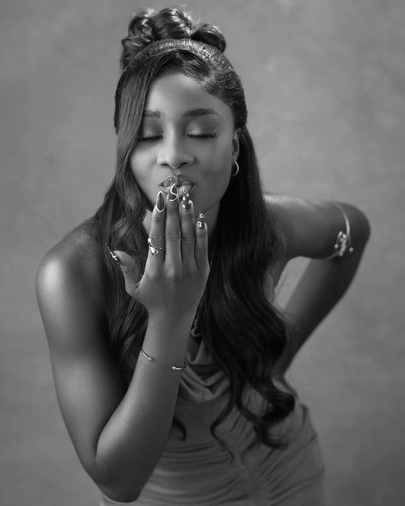 Woman blowing kisses