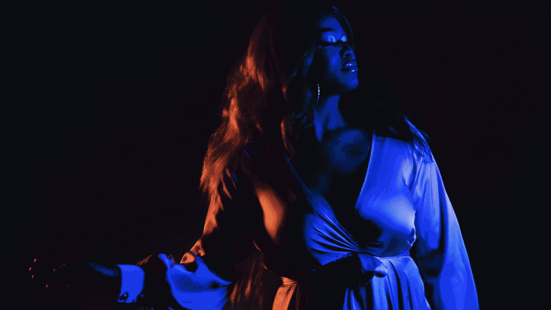 Woman dancing with camera flash