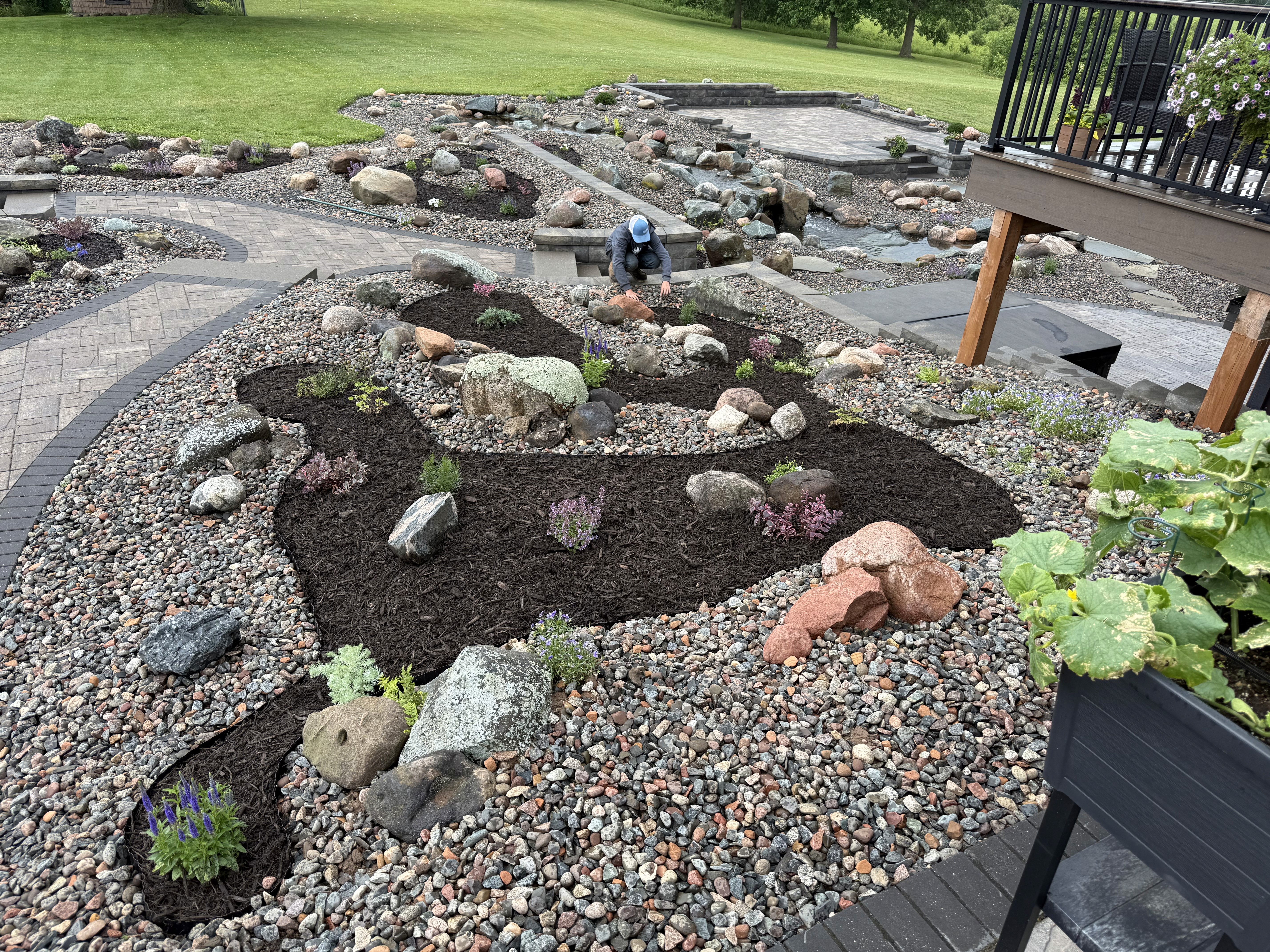 Residential landscaping design with stonework