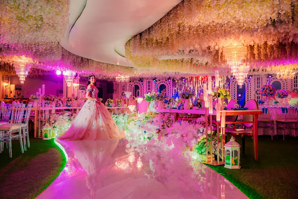 White floral aisle in soft pink light at Celestia Hall, Quezon City