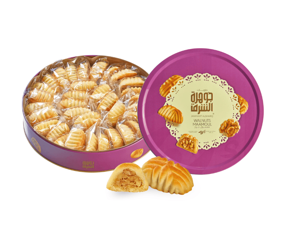 Round tin of Jawhart Al-Sharq Walnuts Maamoul buttery pastries, front view