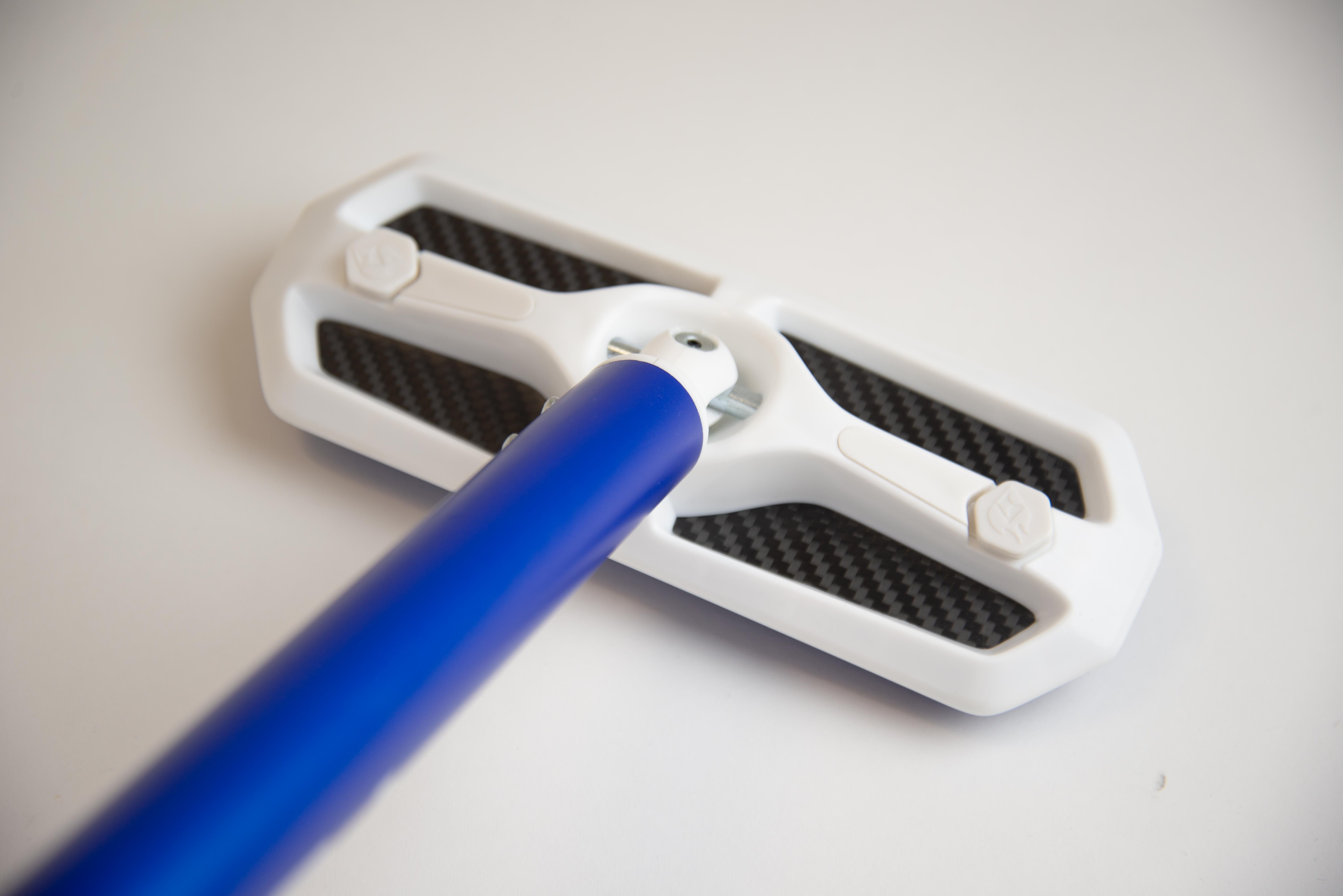 the head of a curling broom