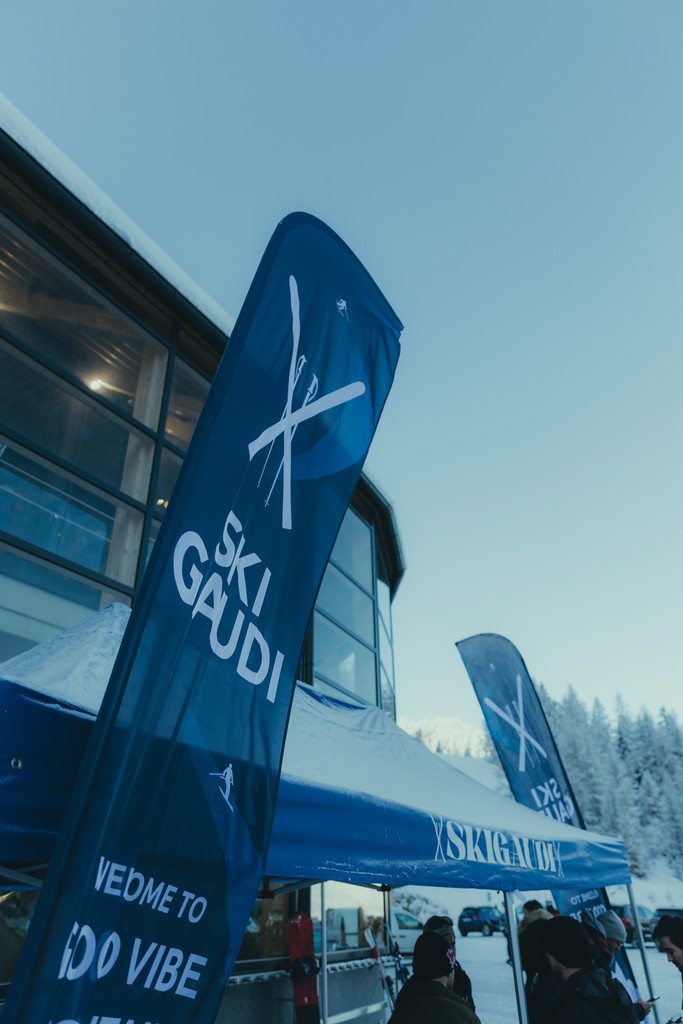 Ski Gaudi event banner at a snowy alpine ski resort.