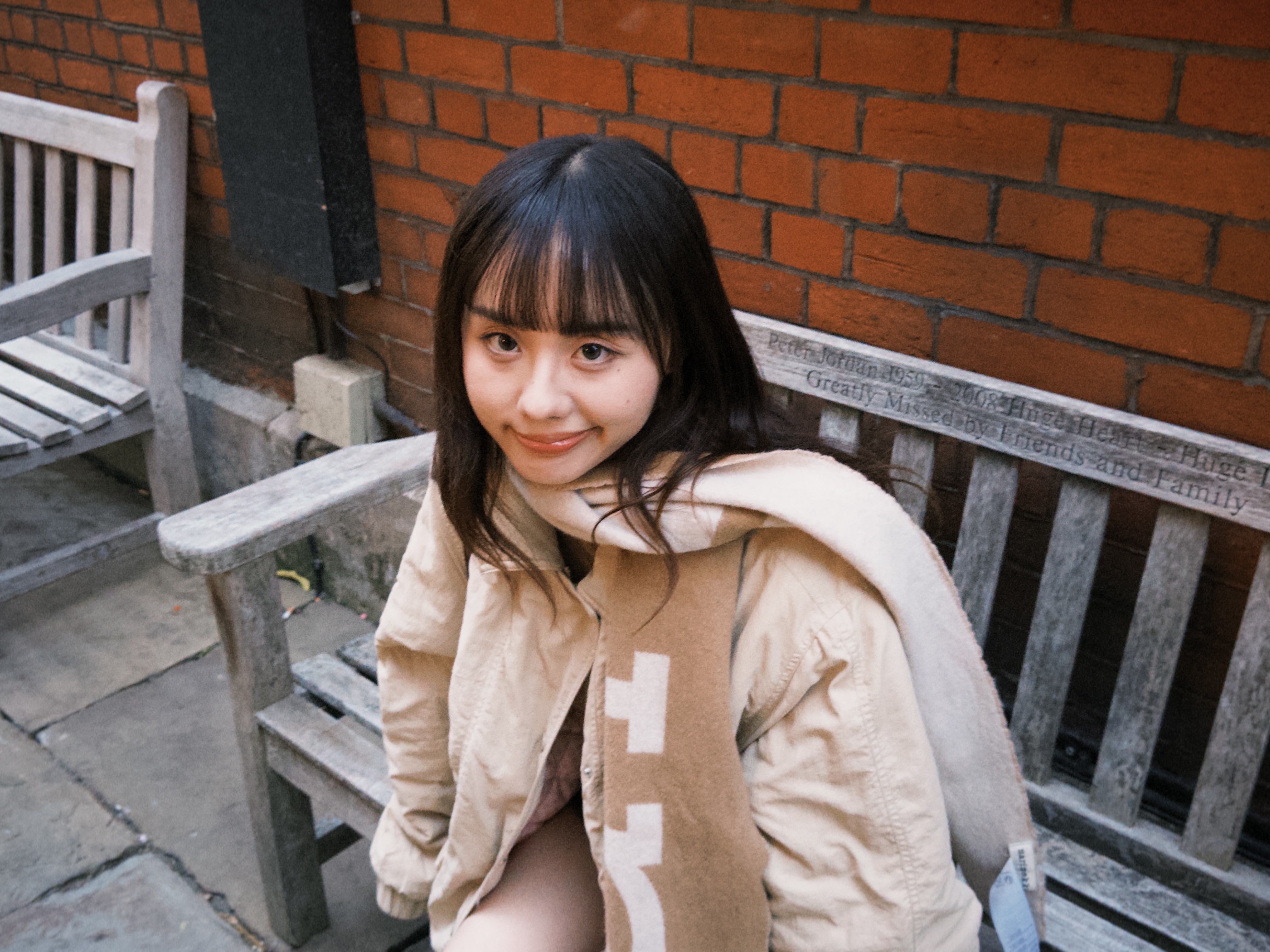 a white car parked in front of a building