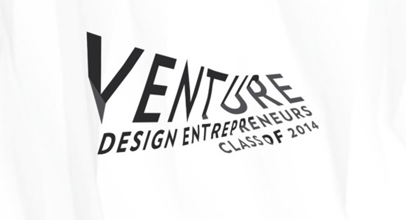 A photo of a white piece of clothing with text: Venture Design Entrepreneurs Class of 2014.