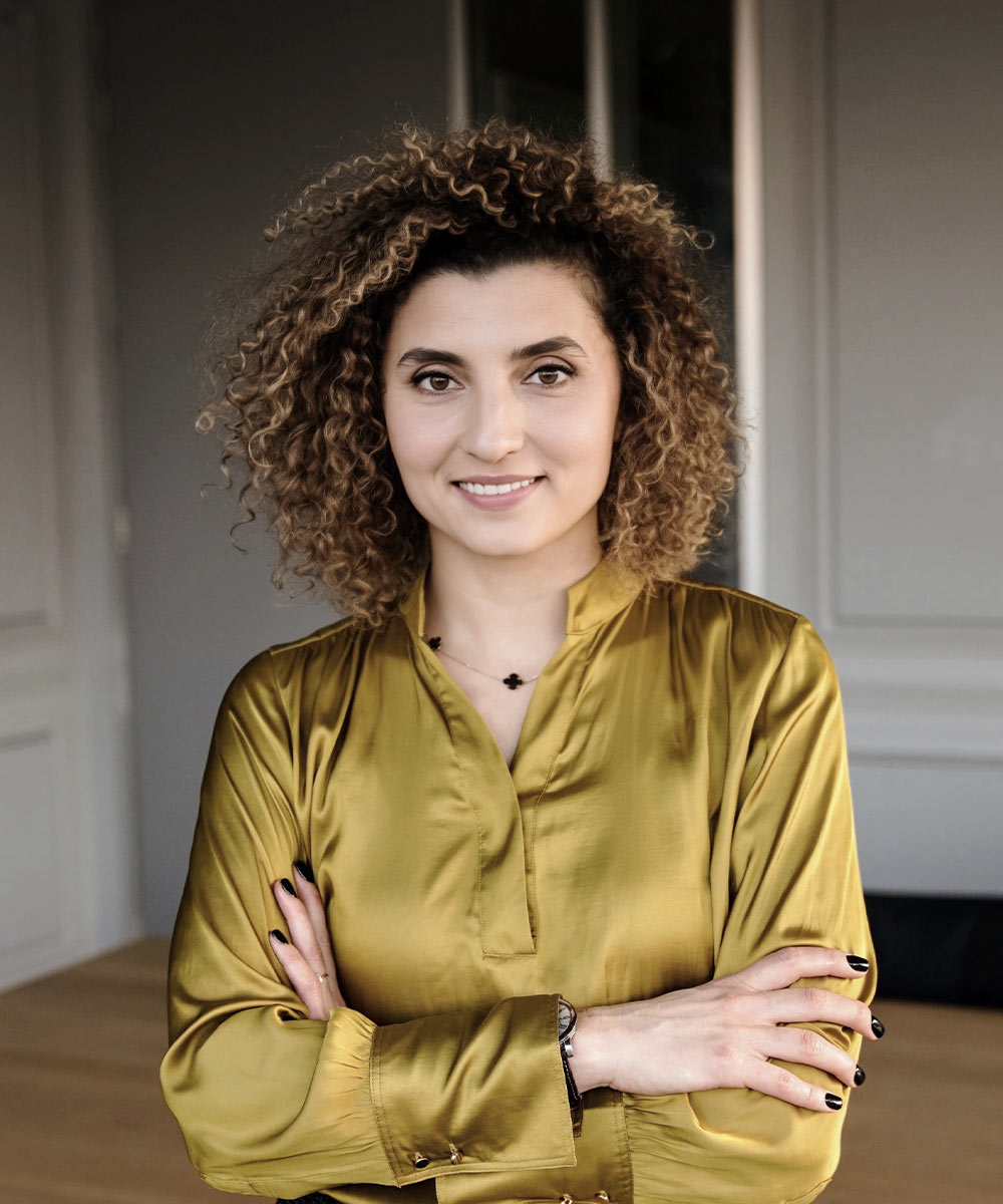 Profile portrait with natural lighting featuring long blonde hair