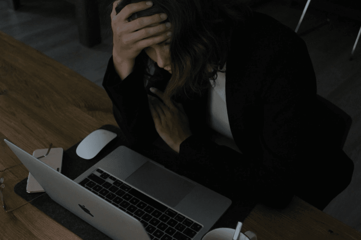 man frustrated staring at computer