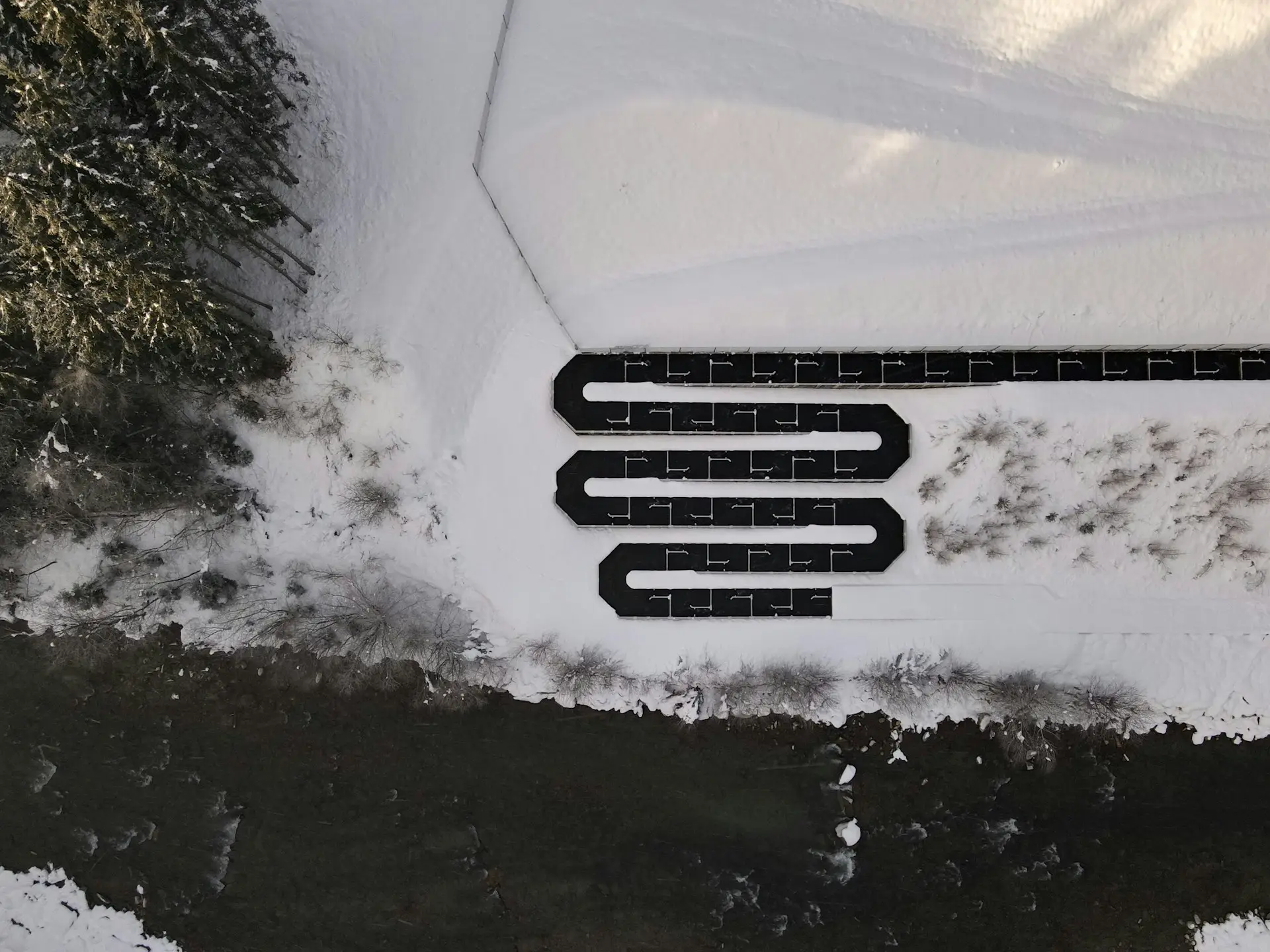 zigzagging road shape in the snow