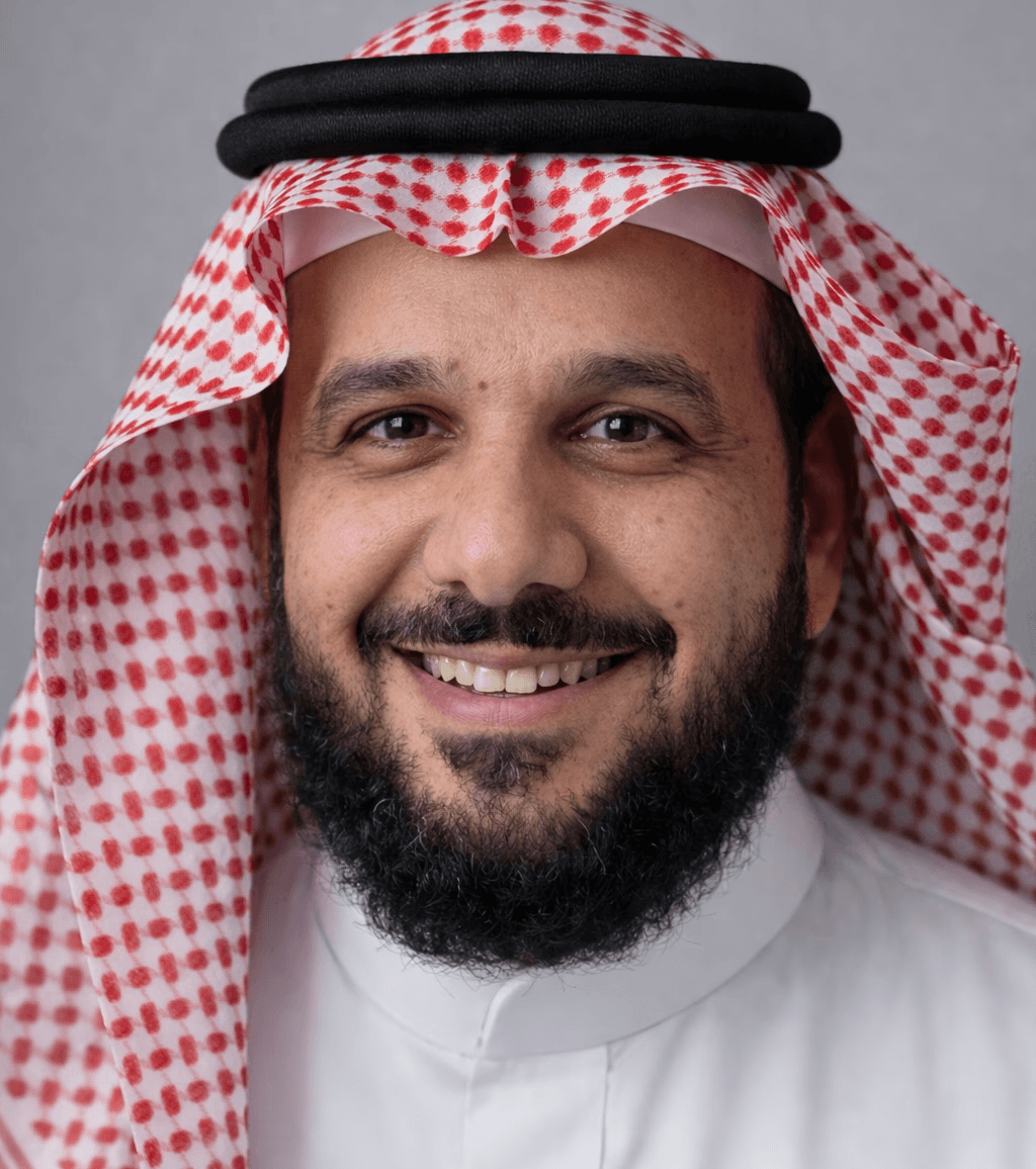 gray metal building frame near tower crane during daytime