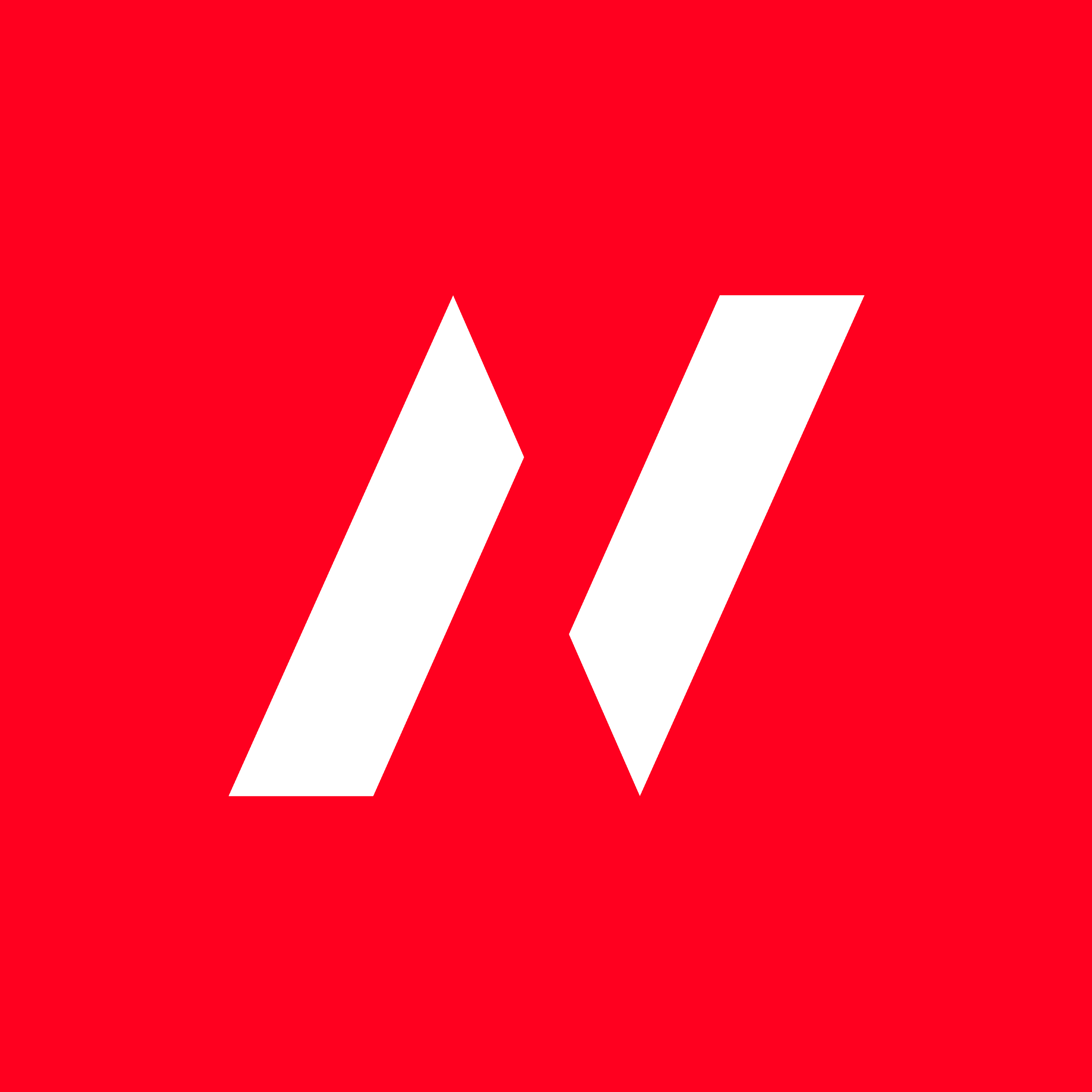 Two women sitting together in a cozy, well-lit workspace, smiling and collaborating over a laptop, with a coffee cup and a bowl on the table.