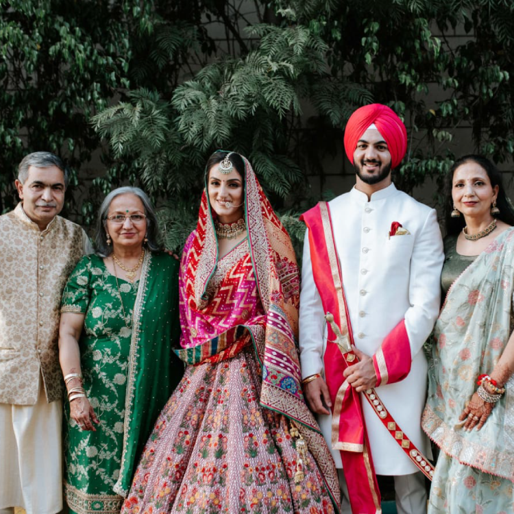 luxury indian wedding family portrait bride groom traditional attire Delhi NCR