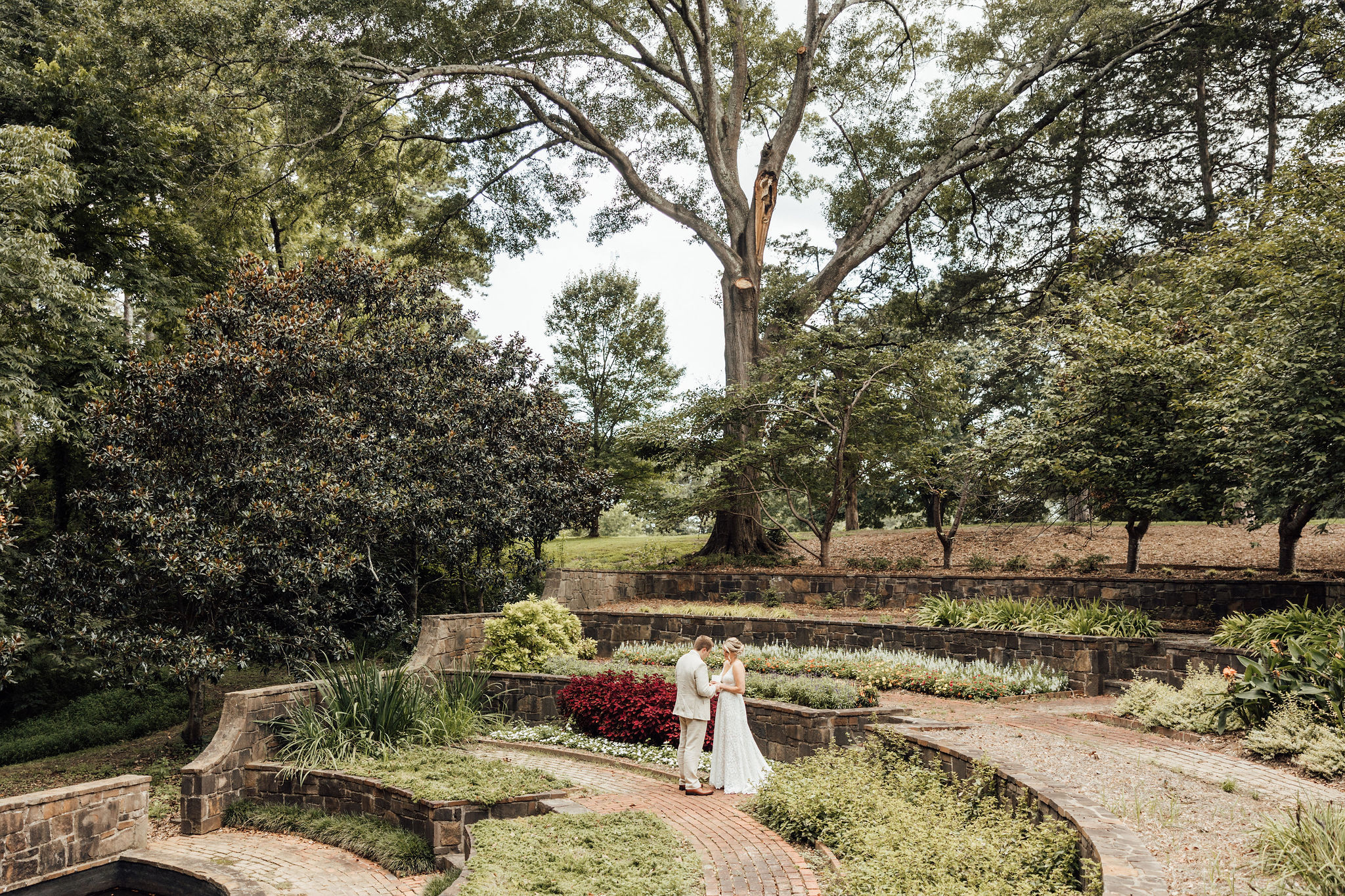 Florals and greenery framing the couple during their ceremony at Berry College.