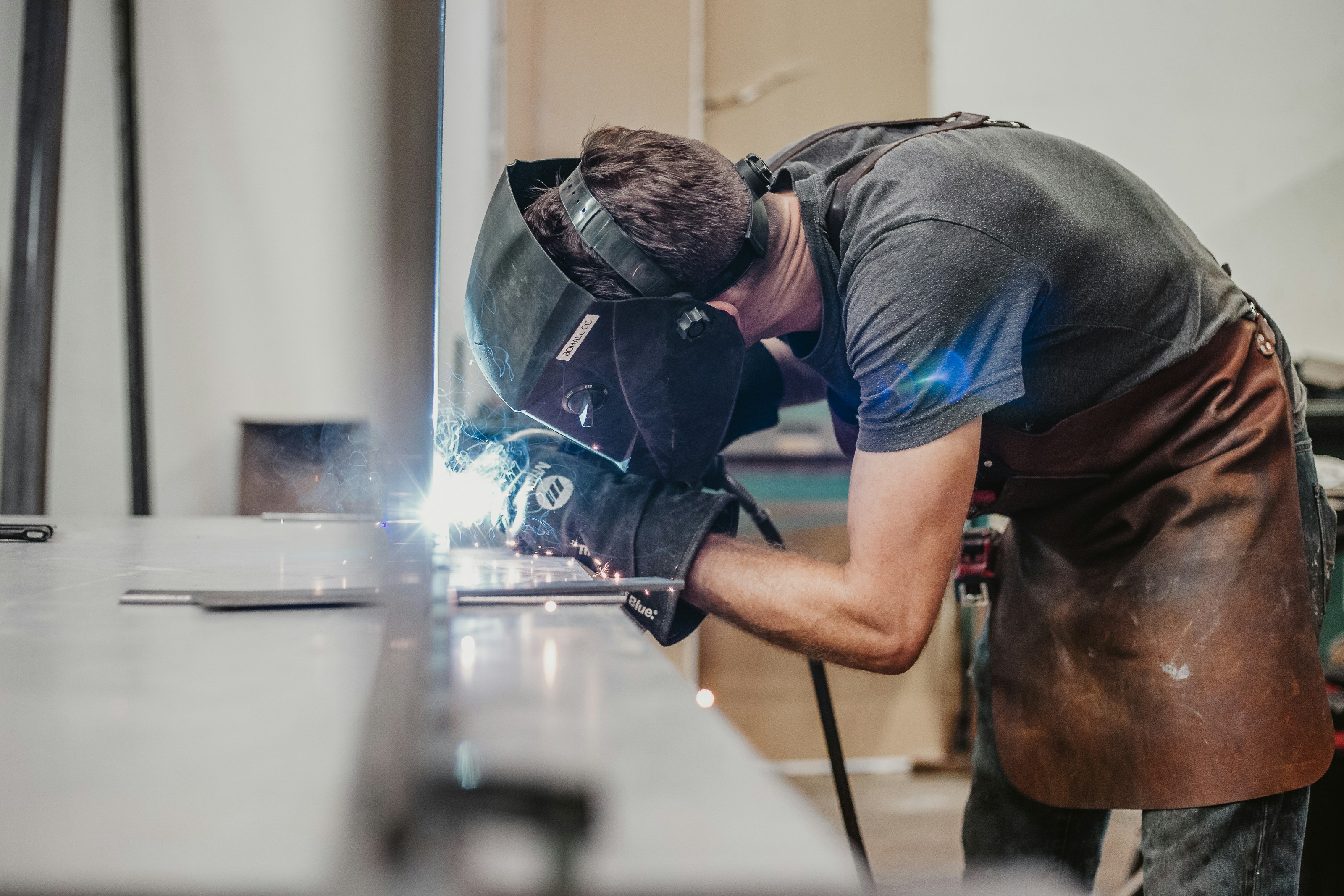 Man welding in shop