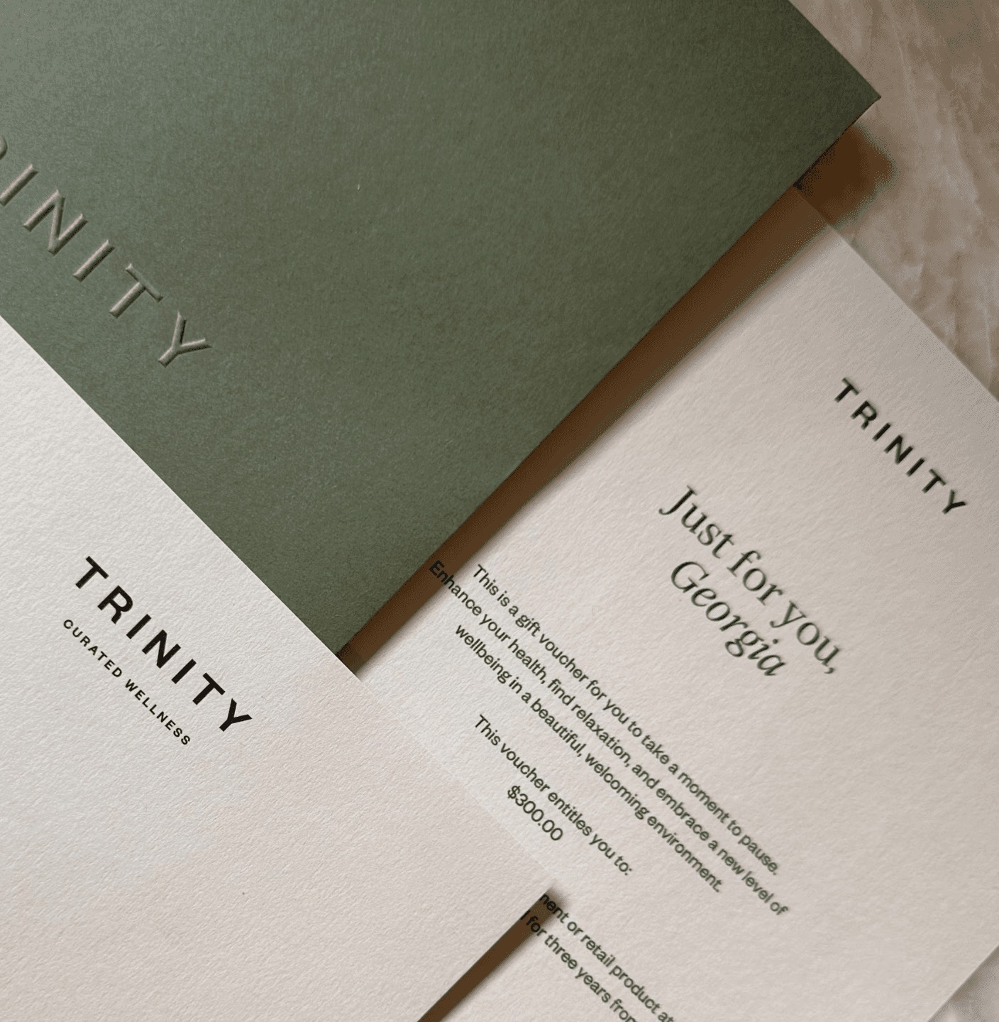 A woman practicing yoga in a spacious studio, positioned on a mat.