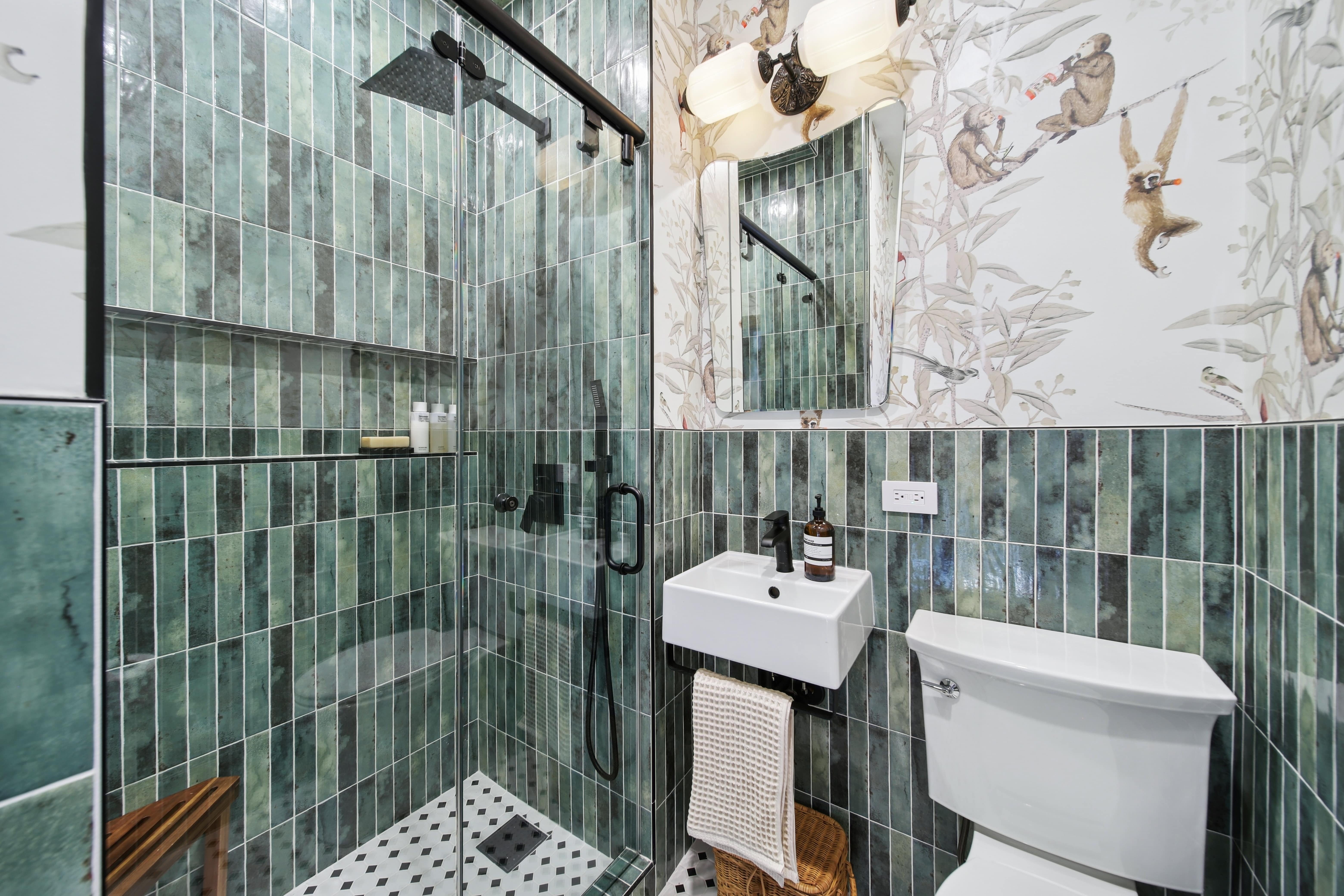 green tiled modern bathroom