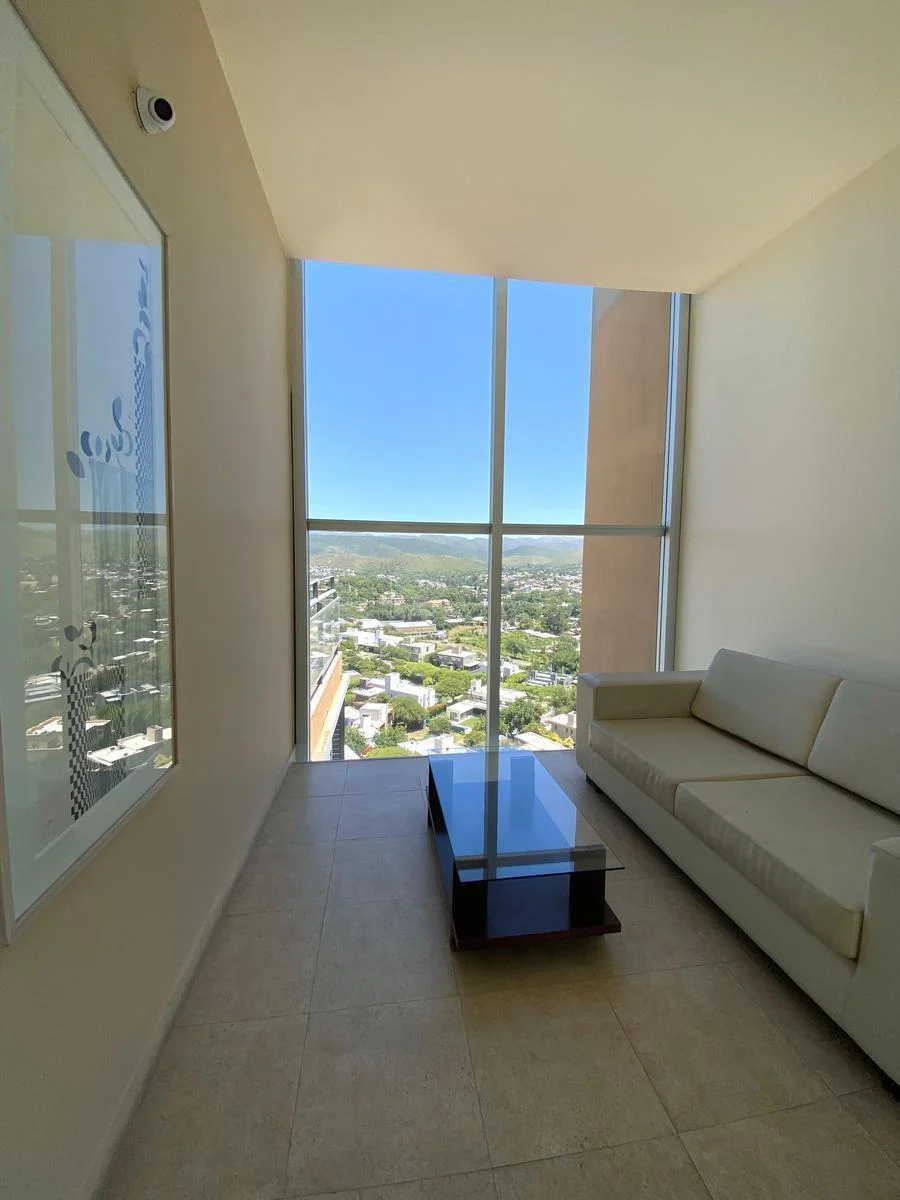 white sofa chair near fireplace