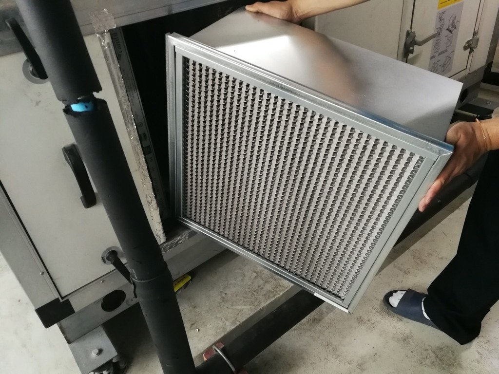 TAFCO panel filter being installaed in an AHU