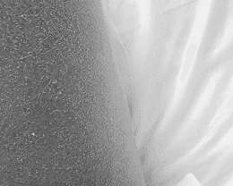 a woman sitting on a chair with her legs crossed