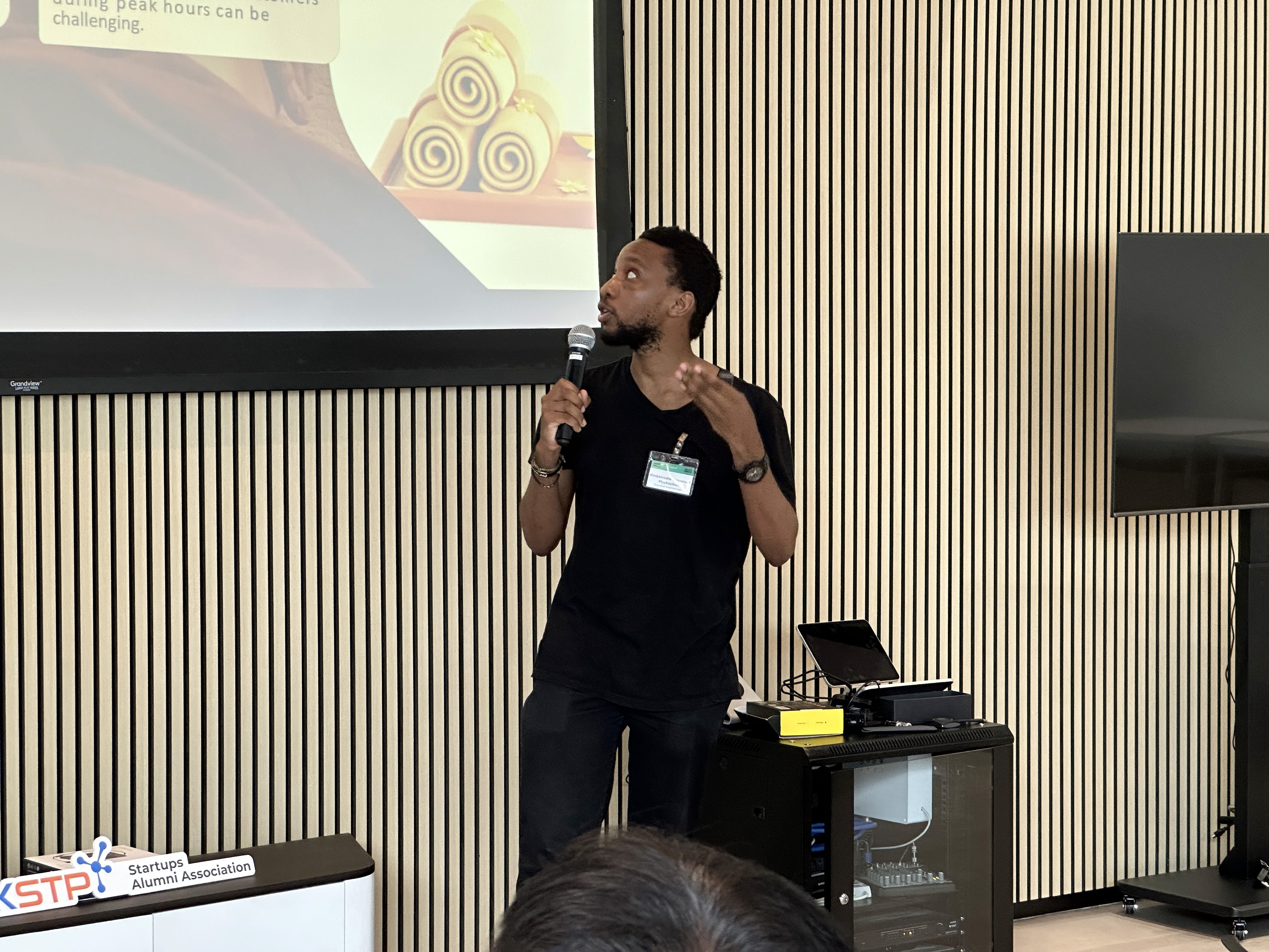 Vimbai pitching at HKSTP SAA gathering.