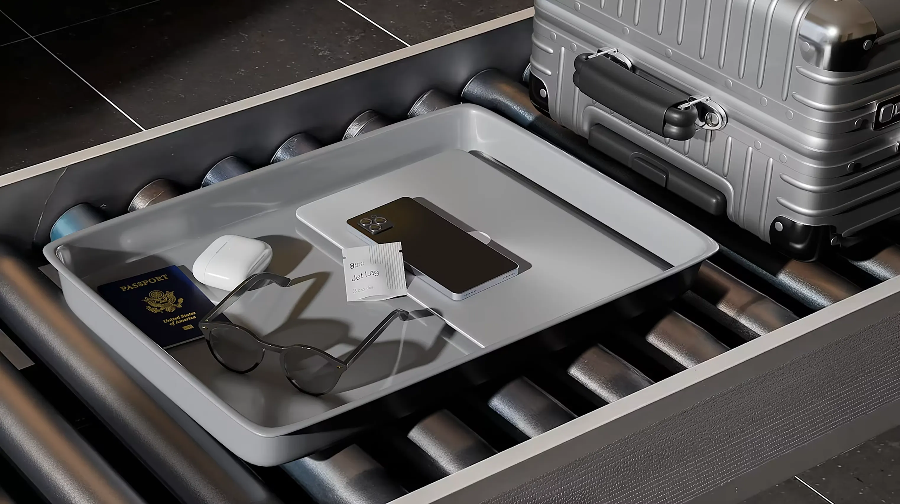 Eight Sleep Jet Lag sachet arranged with travel essentials on an airport security tray
